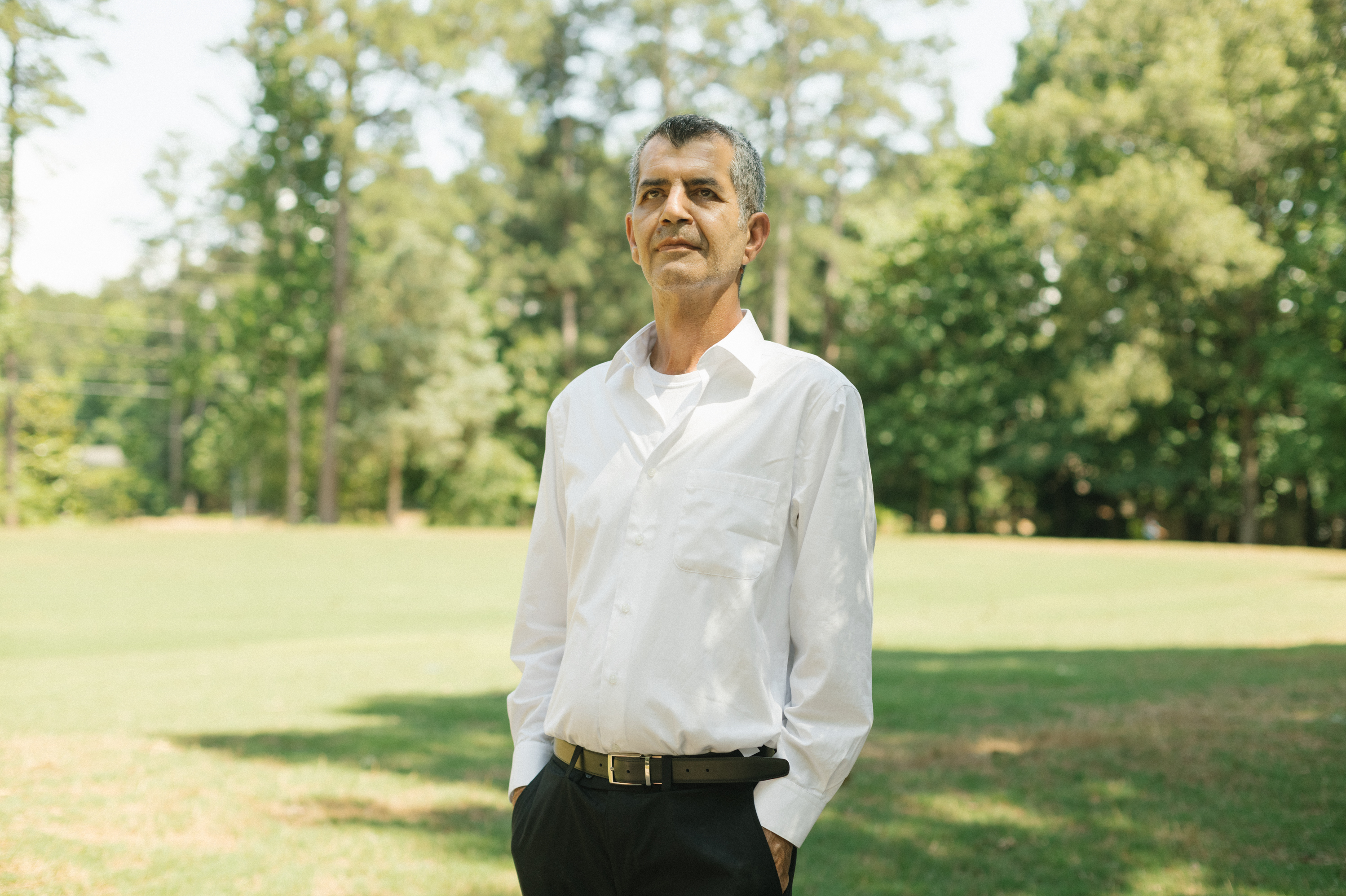 Mehran Mossaddad is a single dad who drives Uber for a living. But when the pandemic hit, he stopped because he couldn't leave his daughter home alone. He fell behind on rent and is facing eviction. (Lynsey Weatherspoon for NPR)