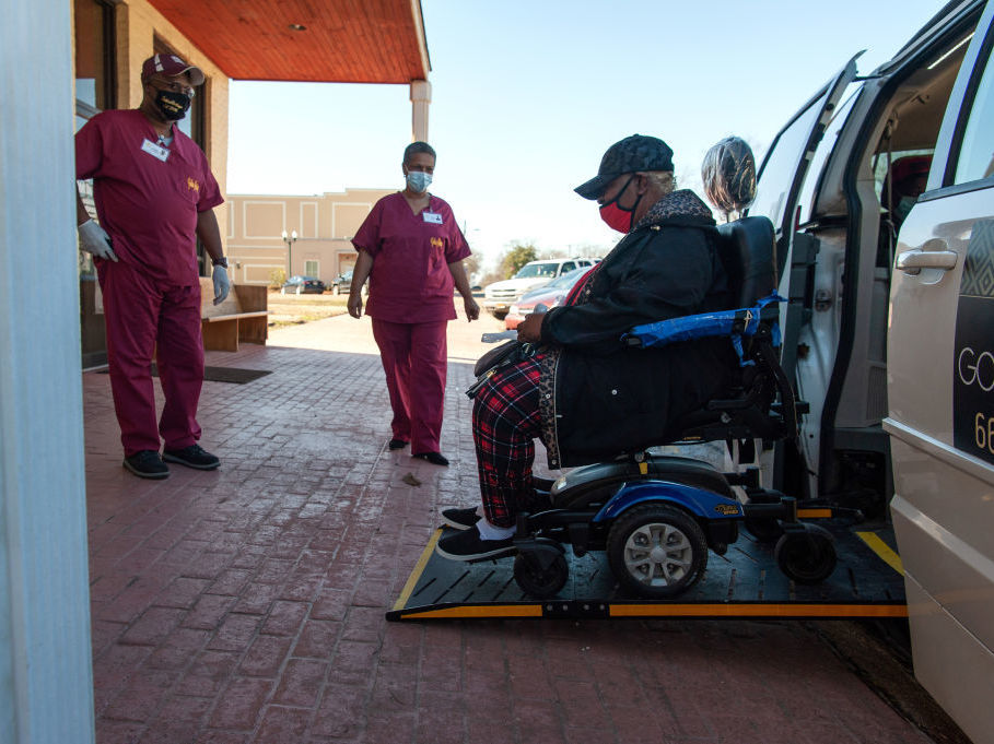 Poverty and disability are linked to lower vaccination rates in some rural communities. The Vaccination Transportation Initiative sponsored van helps rural residents get the COVID-19 vaccine in rural Mississippi. The effort works to overcome the lack of transportation and access to technology for rural residents. (Bloomberg via Getty Images)