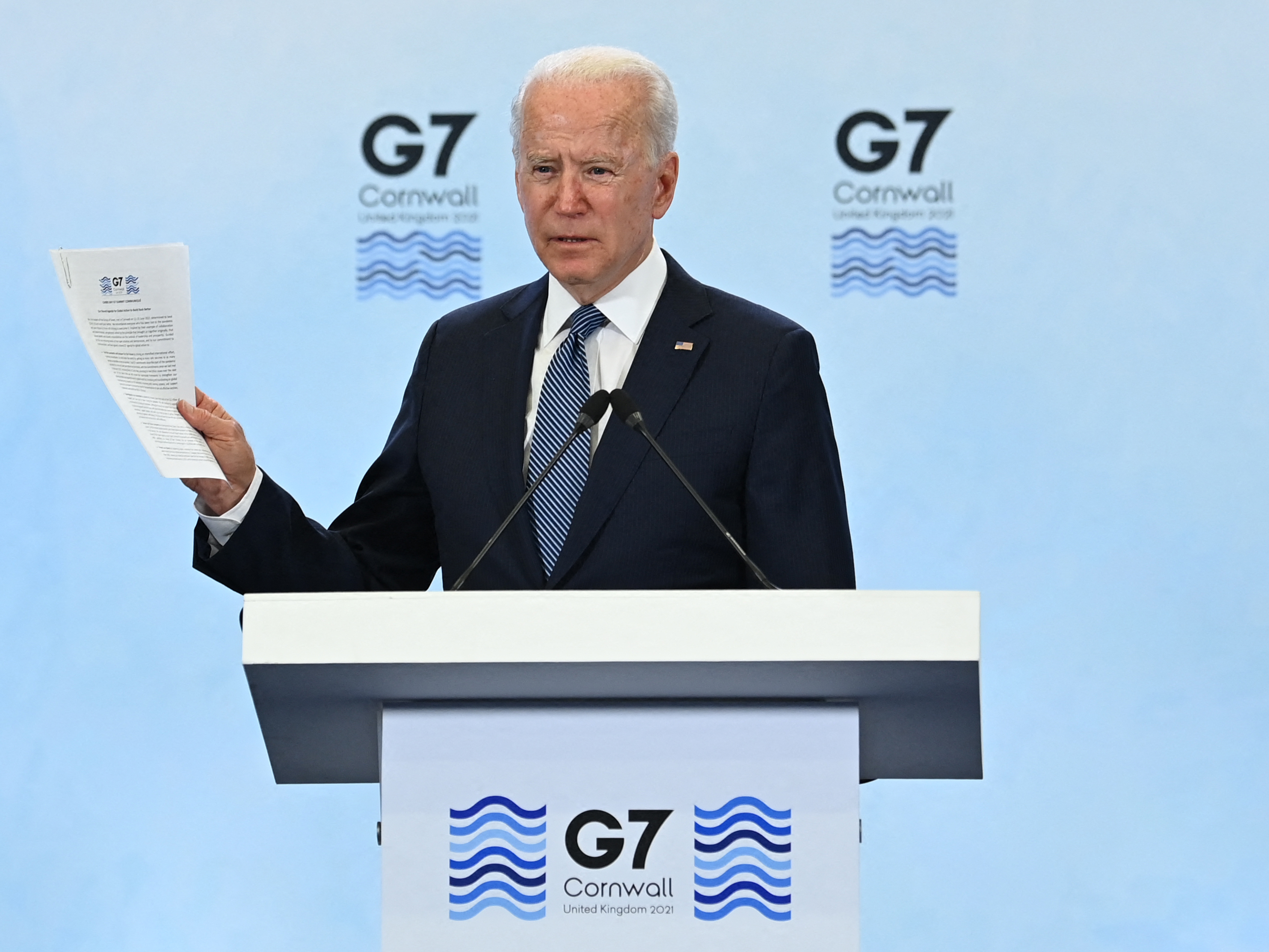 President Biden talks to reporters after the G-7 summit in Cornwall. Leaders took a notably strong stance on China in their final agreement. (AFP via Getty Images)