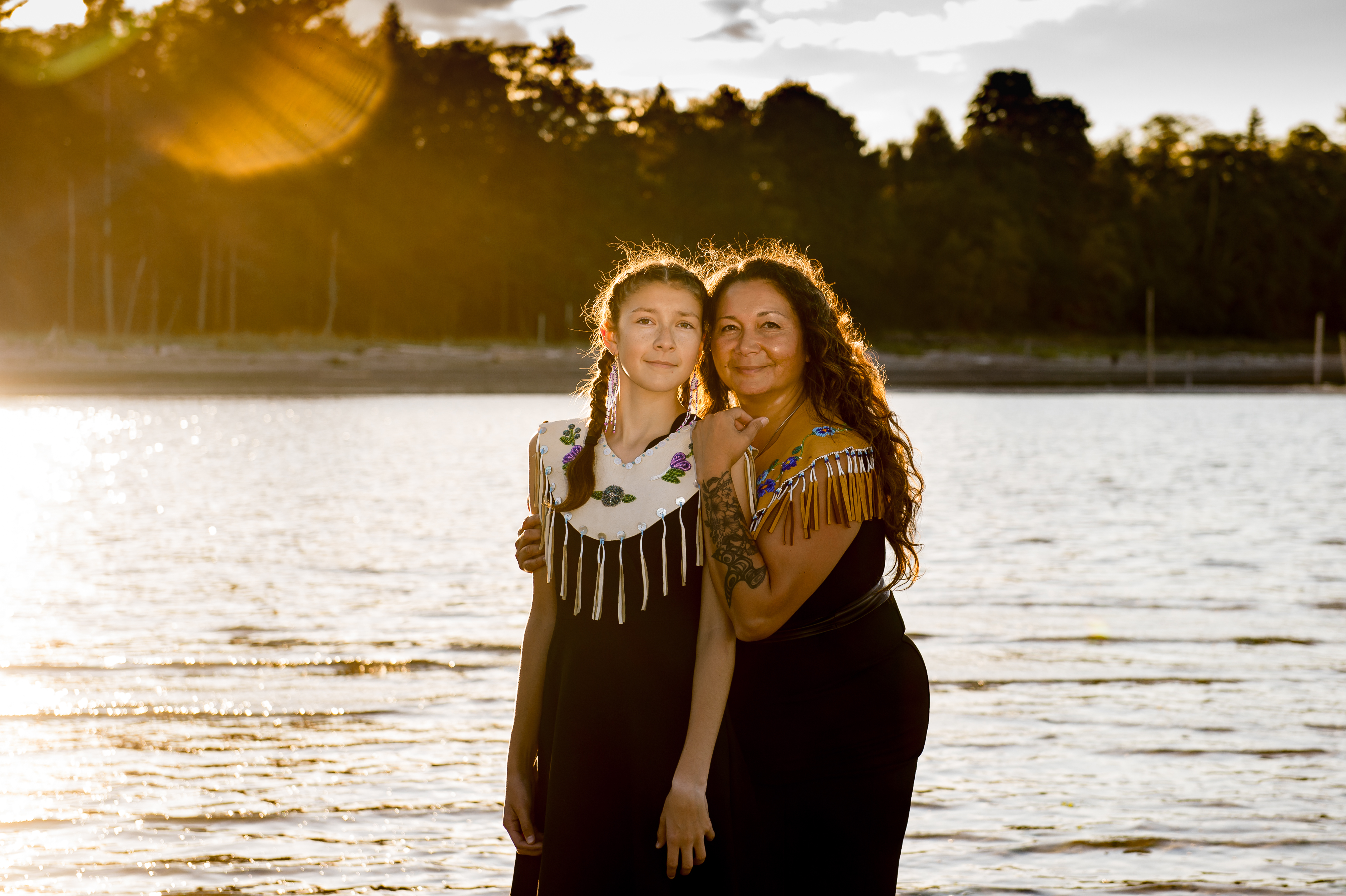 Danita Bilozaze, alongside her daughter Dani, celebrated the completion of her master's degree in education with a portrait session last year at Kye Bay in the Comox Valley, British Columbia. Bilozaze's studies focused on Indigenous language revitalization. (McKinnon Photography)