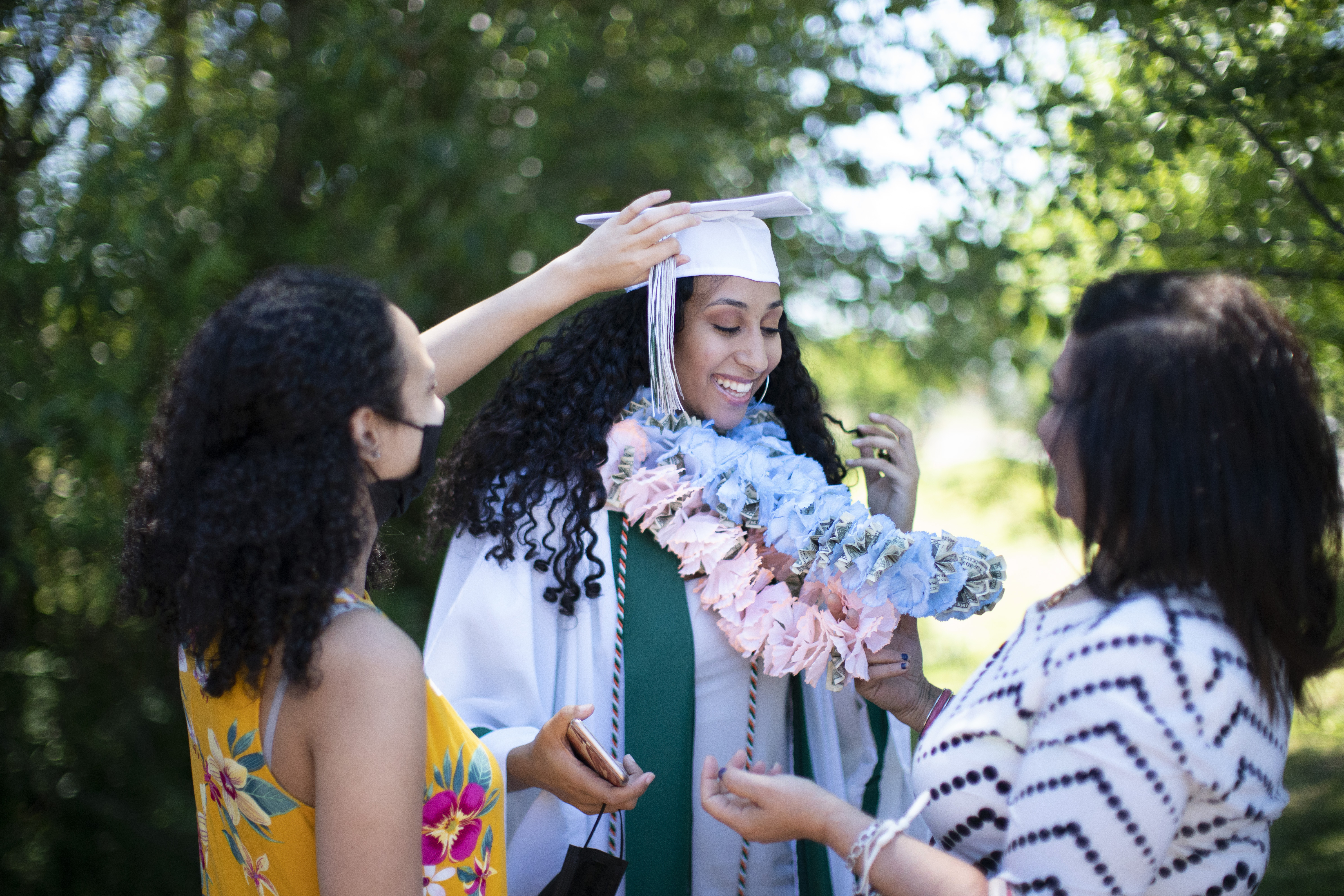 High School Graduations Brought Joy This Year, Even If They Weren't Back To Normal 2 Senior Gina Elabd prepares for her Reynolds High School graduation ceremony.