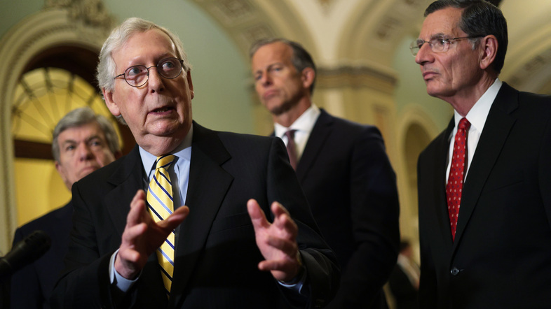 Senate Minority Leader Mitch McConnell, R-Ky., speaks Tuesday after the weekly Senate Republican Policy luncheon. McConnell united his caucus in opposition to Democrats' election overhaul bill. (Alex Wong/Getty Images)