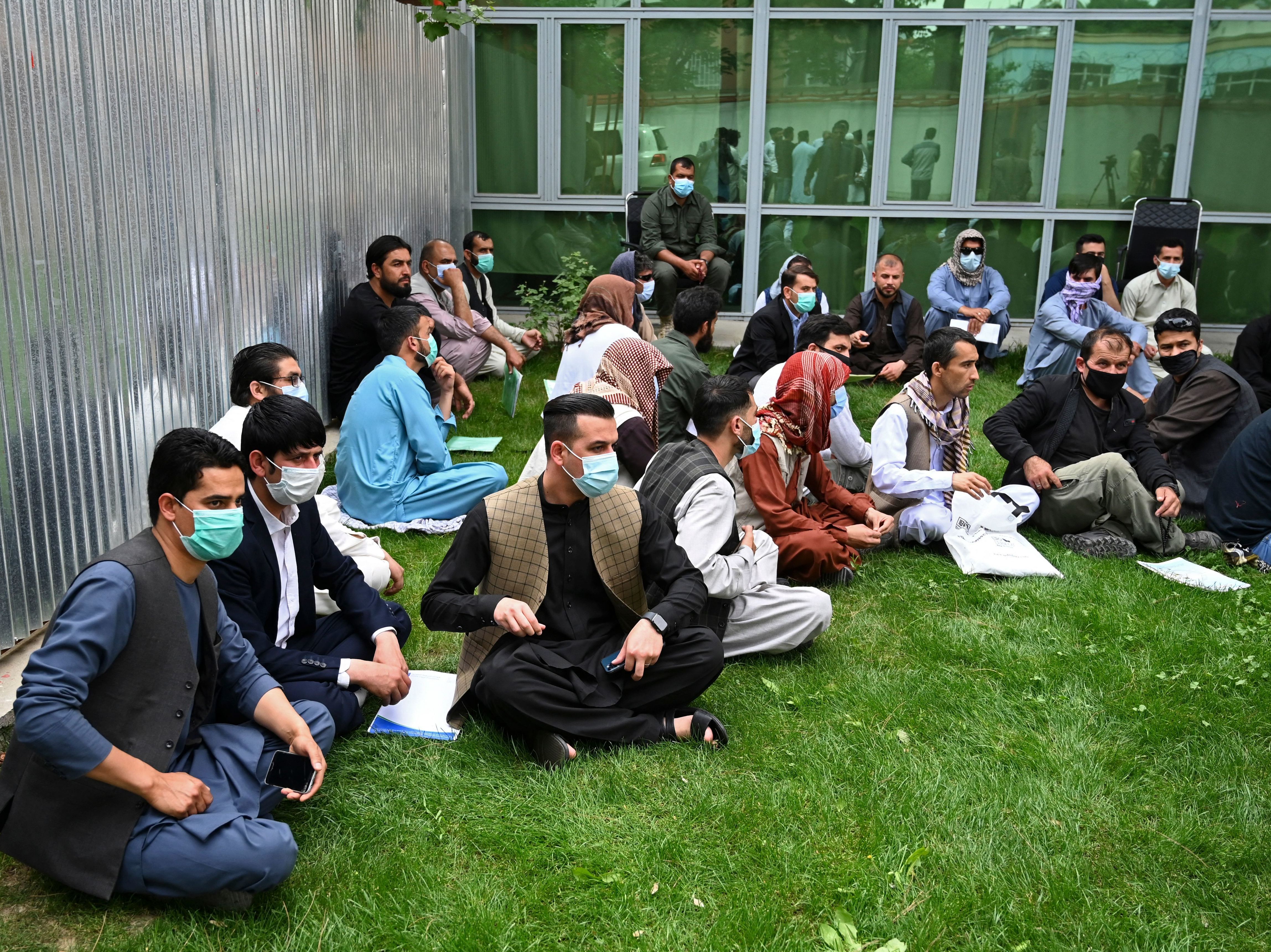 Former interpreters for U.S. and NATO forces gather during a demonstration in downtown Kabul, Afghanistan, on April 30, on the eve of the beginning of Washington's troop withdrawal. (AFP via Getty Images)