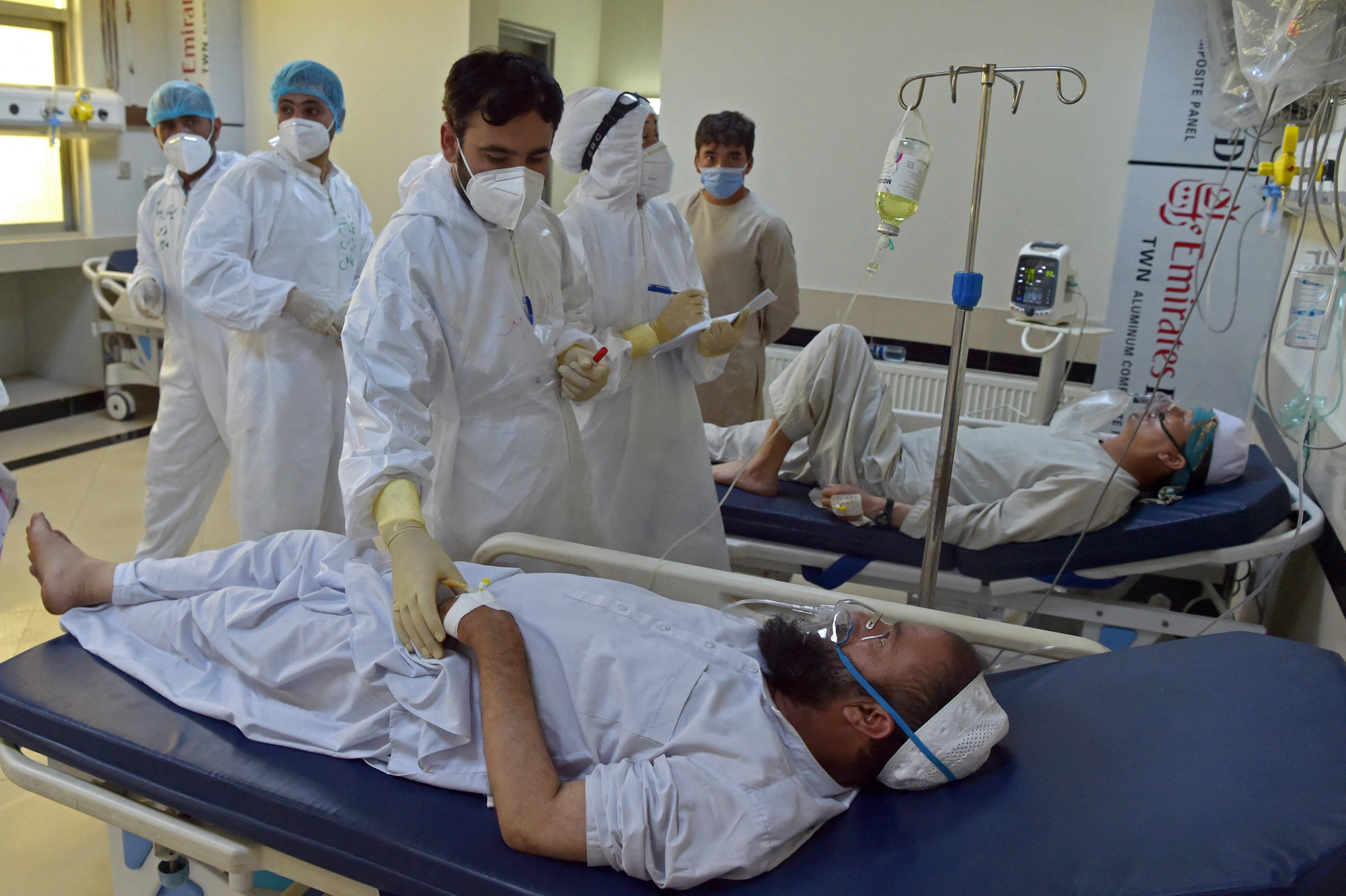 Medical personnel treat COVID-19 patients in June in the intensive care unit at Muhammad Ali Jinnah Hospital in Kabul, Afghanistan. (AFP via Getty Images)