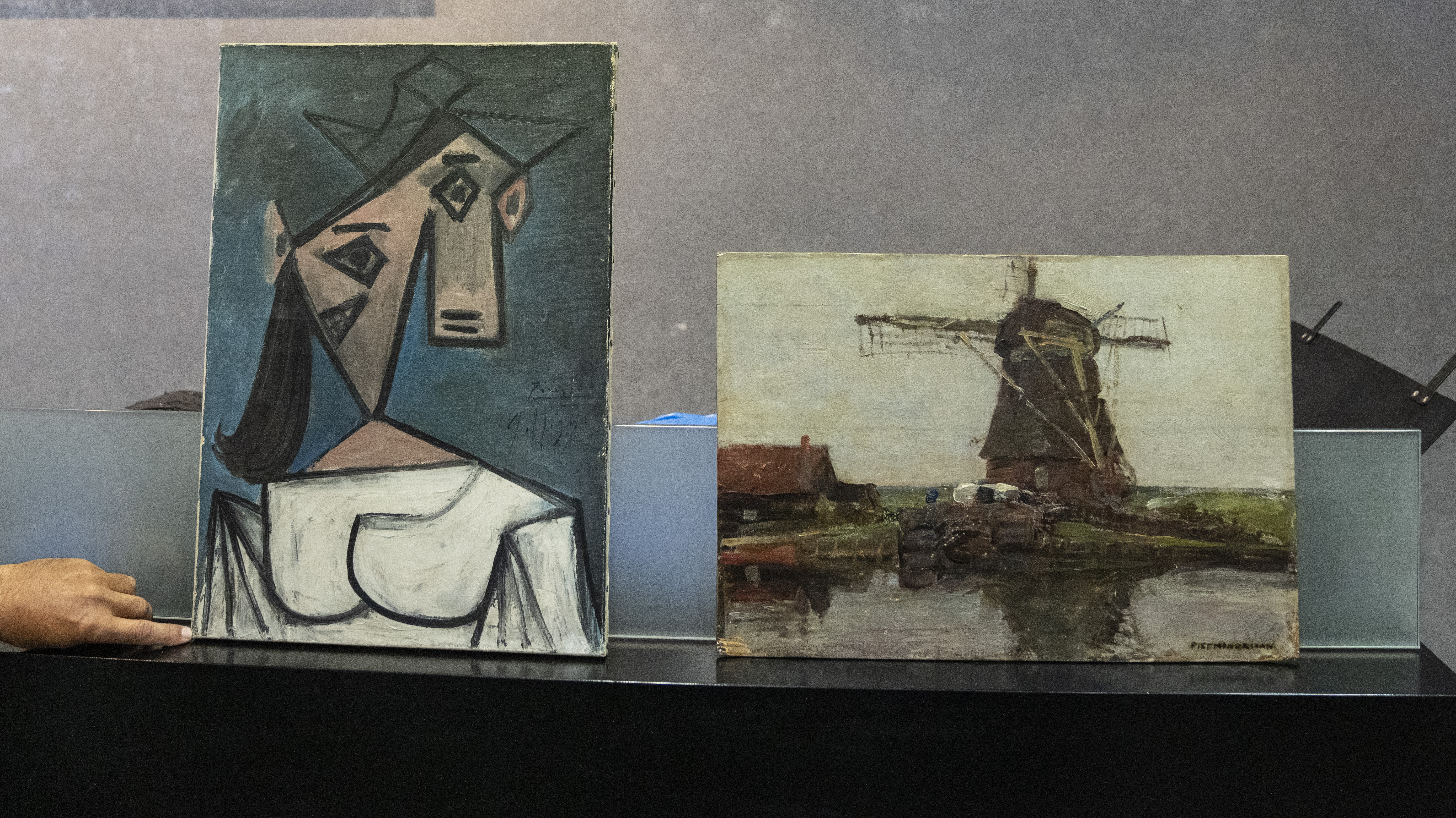 Greek police says they have recovered two paintings by 20th century masters Pablo Picasso and Piet Mondrian, nearly a decade after their theft from the country