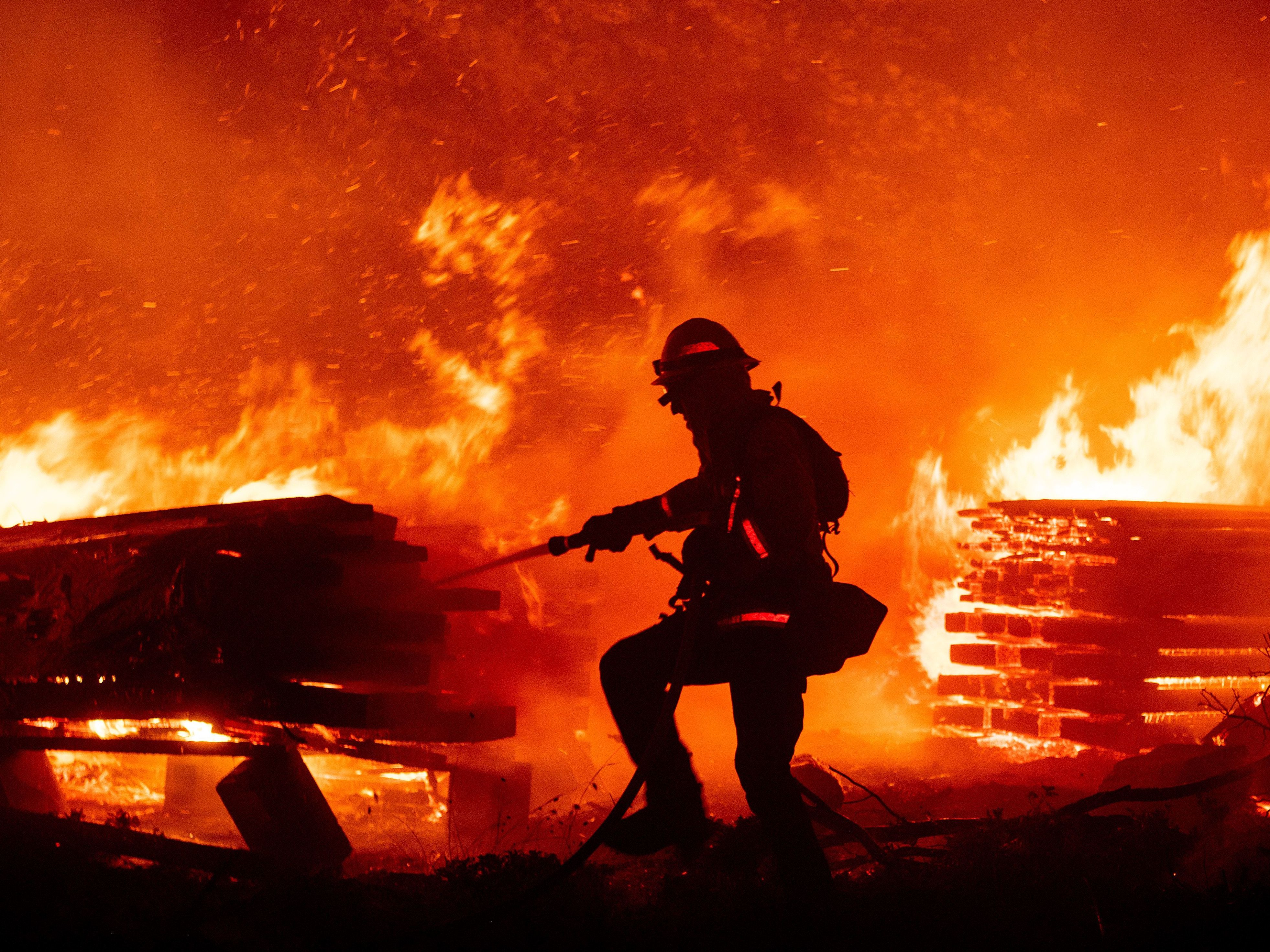 As Western Wildfires Worsen, FEMA Is Denying Most People Who Ask For Help 3 A firefighter douses flames as they push toward homes during the Creek Fire in the Cascadel Woods area of Madera County, Calif., on Sept. 7, 2020. FEMA denied 86% of claims during last year's fire season in California.