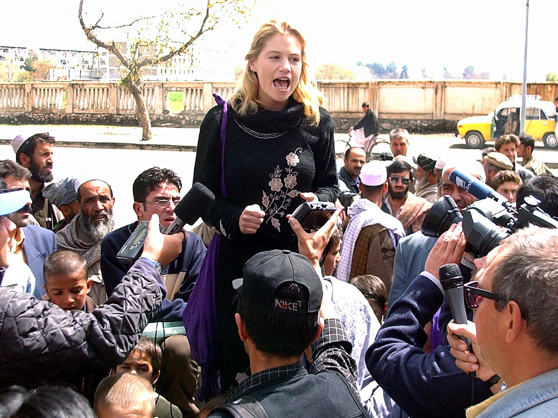 In this April 7, 2002 photo, Marla Ruzicka leads a demonstration calling for U.S. compensation to victims of the recent military campaign in Afghanistan, outside of the U.S. Embassy in Kabul. (ASSOCIATED PRESS)
