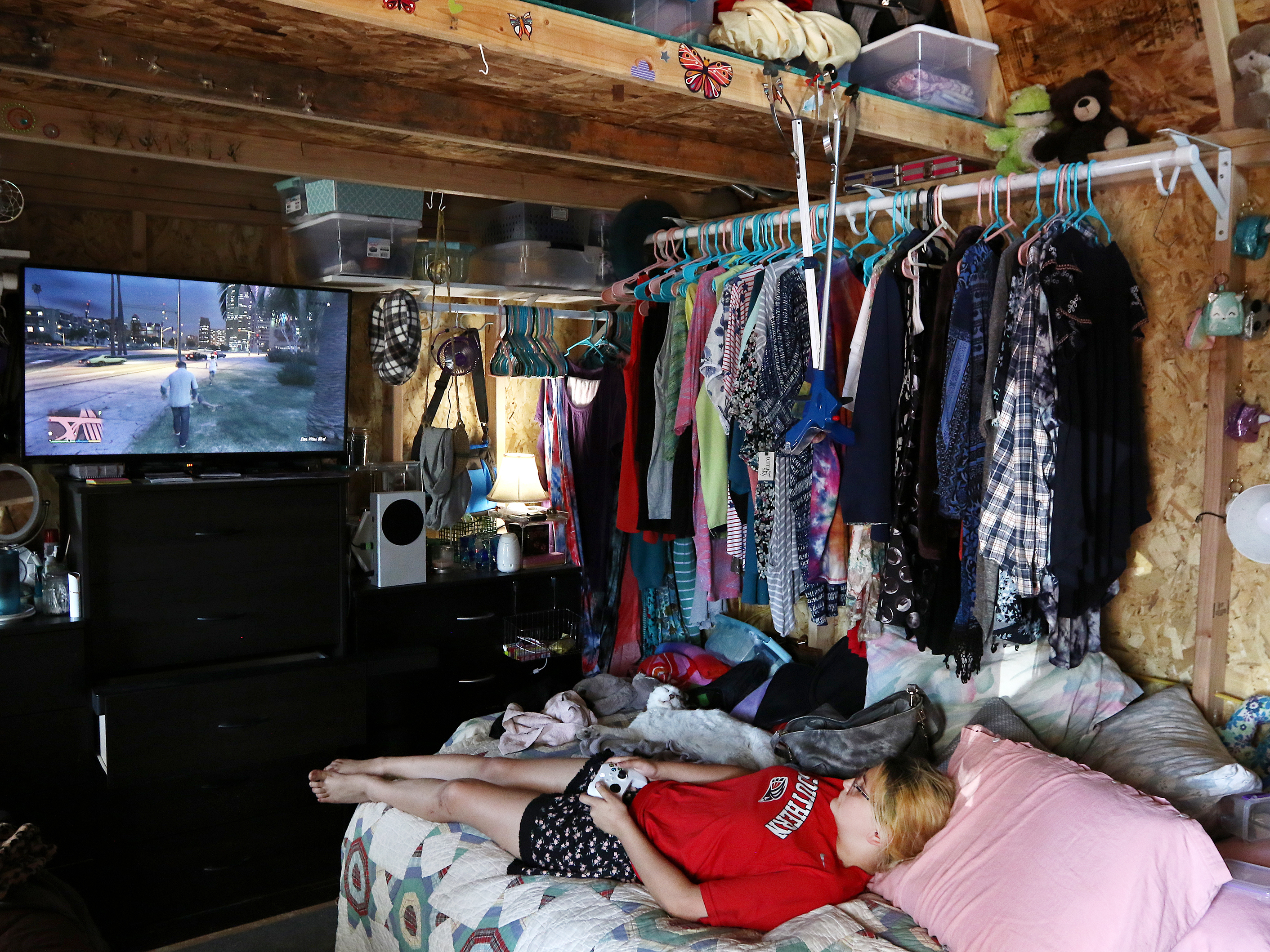 As Western Wildfires Worsen, FEMA Is Denying Most People Who Ask For Help 7 Chelsee Parker, 15, plays a video game in a shed that serves as her temporary home with her parents. Her mother, Robin Parker, says the insurance settlement won't be enough to cover all the losses from the fire.