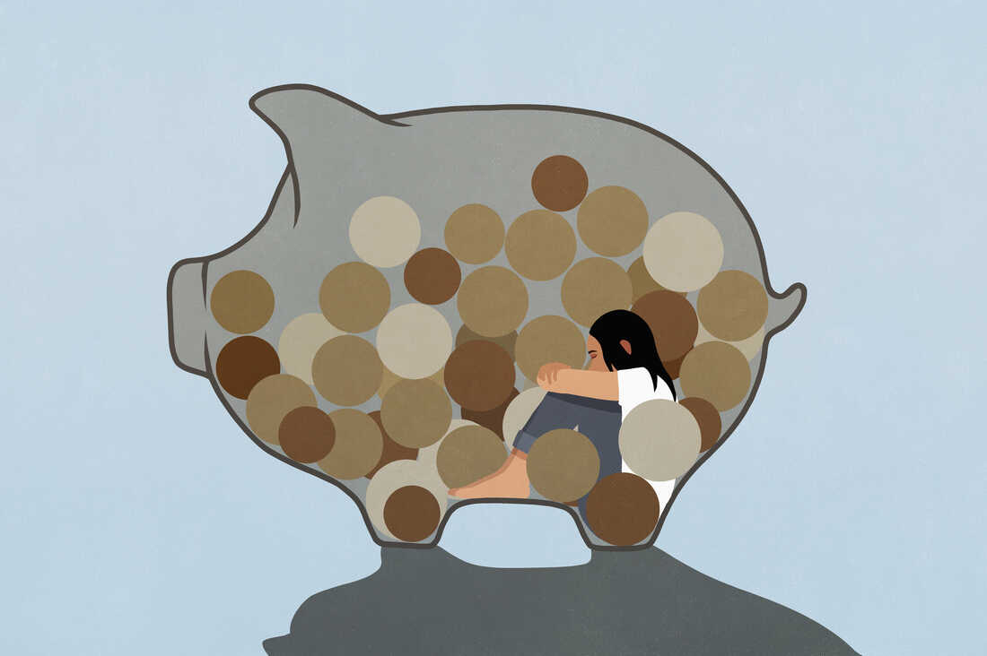 Illustration of a woman curled up inside a piggy bank, looking sad. The piggy bank is filled with coins. The piggy bank is set against a light blue backdrop.