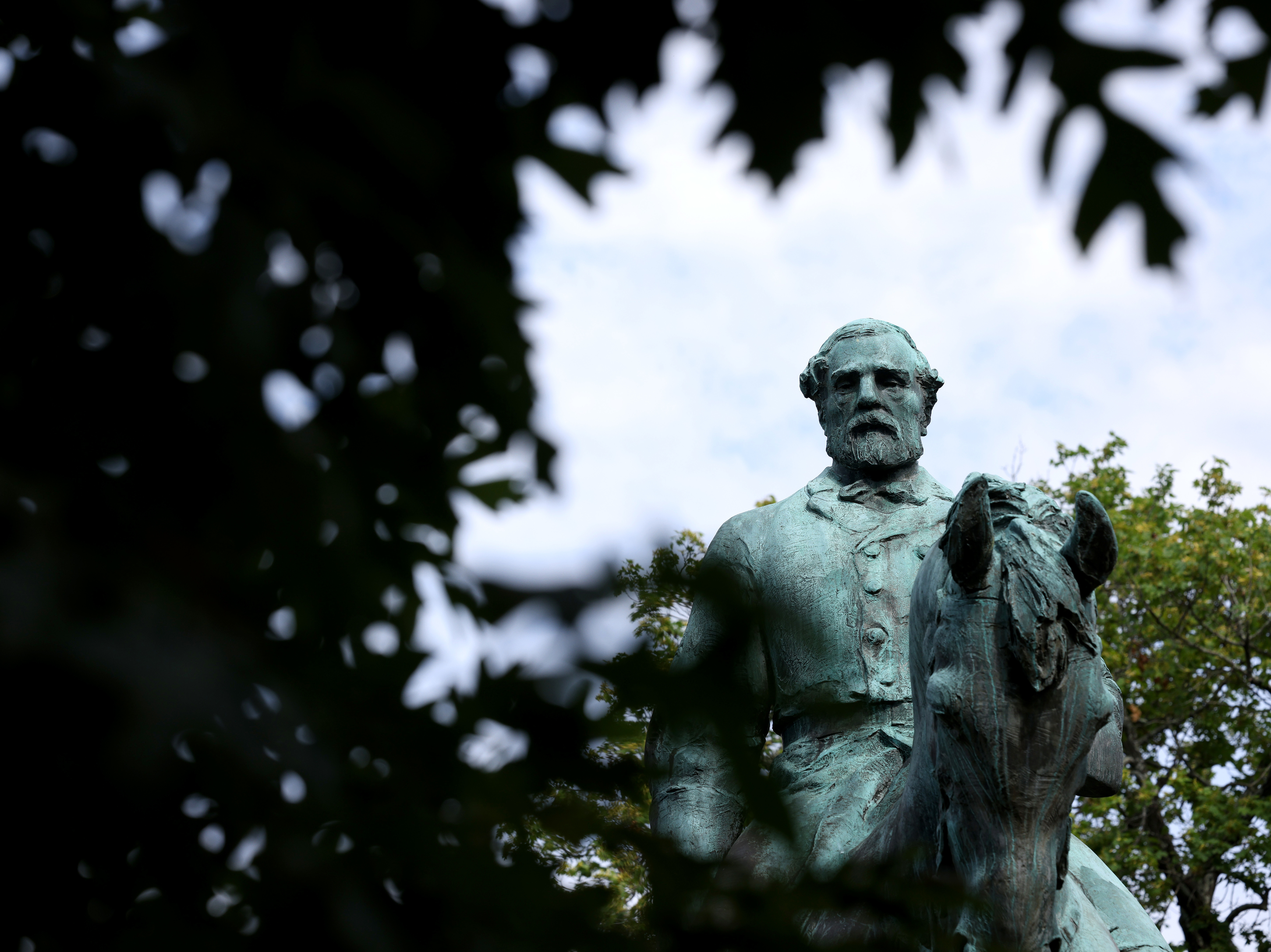 A statue of Confederate Gen. Robert E. Lee is shown in Market Street Park July 9, 2021 in Charlottesville, Va. The statute, along with another of Gen. Stonewall Jackson, will be removed Saturday. (Getty Images)