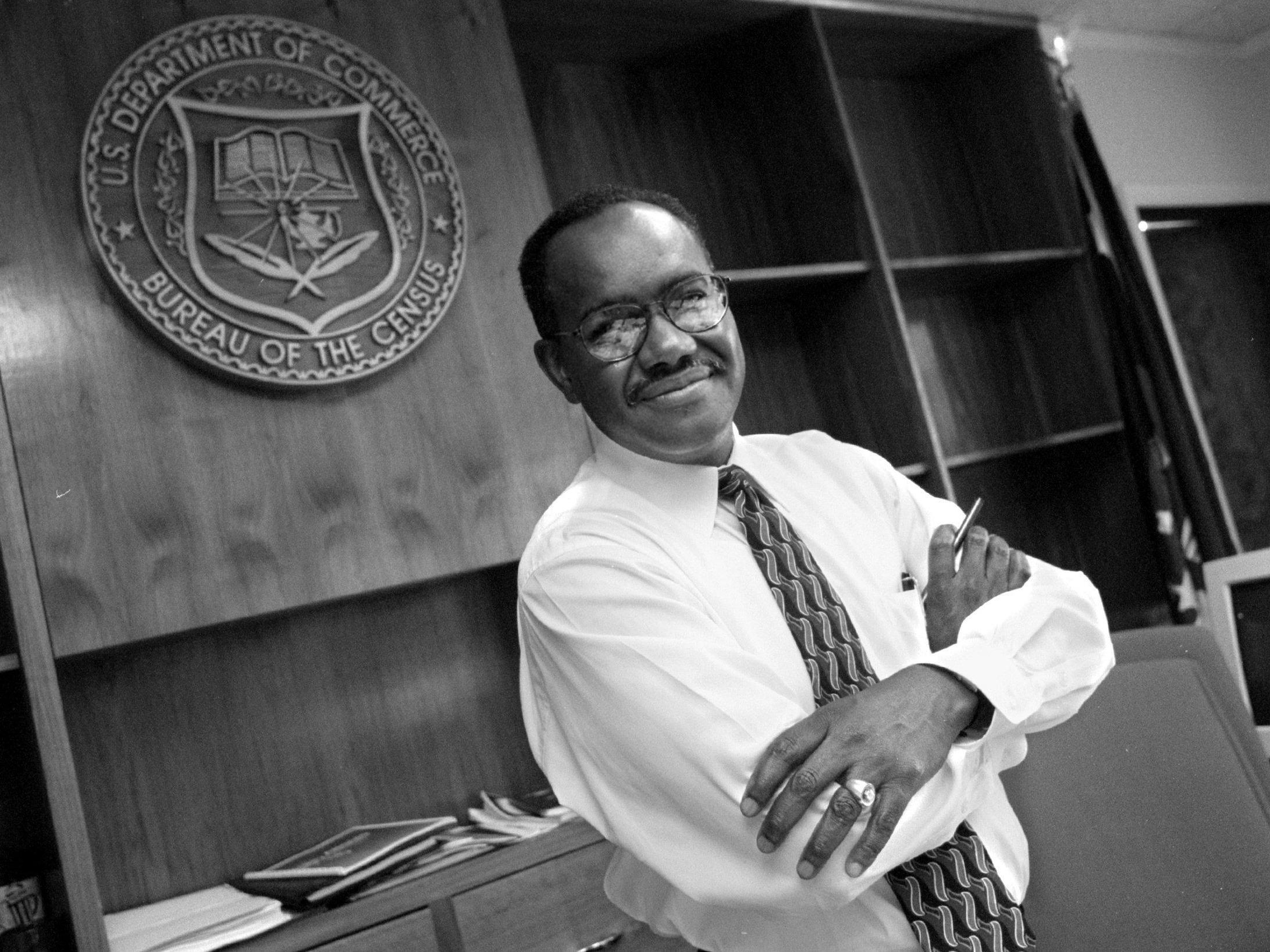 James F. Holmes, the first-ever person of color to oversee the U.S. head count, stands inside his office at the Census Bureau's former headquarters in Suitland, Md., in 1998, when Holmes served as acting director for about nine months. (The Washington Post via Getty Images)