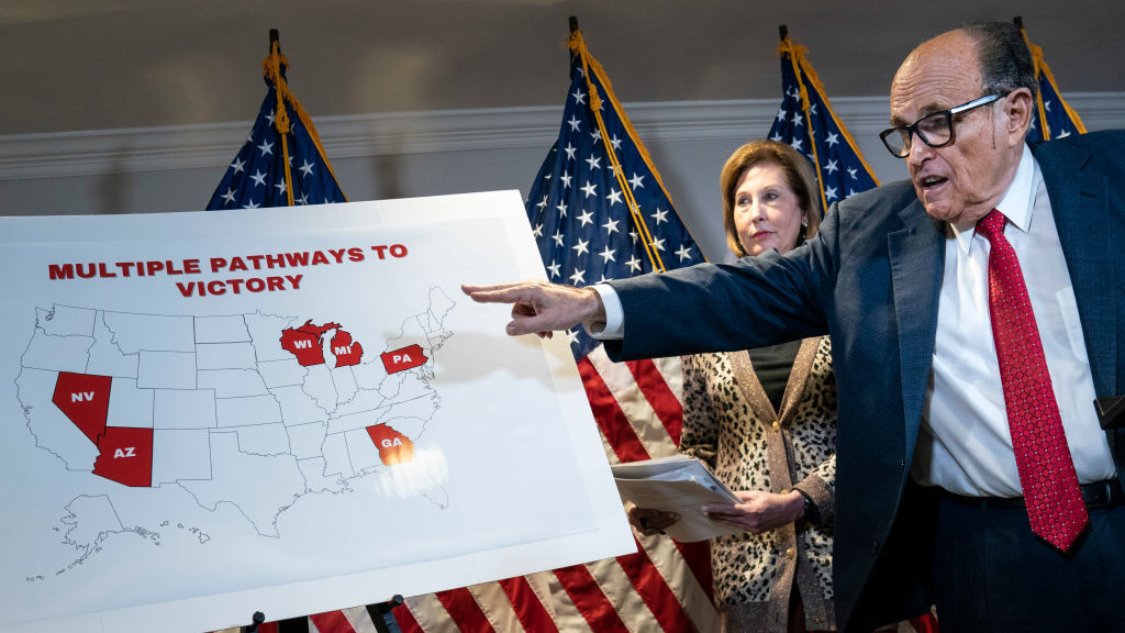Rudy Giuliani points to a map as he speaks to the press about various lawsuits related to the 2020 election on Nov. 19, 2020. He and other Trump lawyers are now under scrutiny for their roles in promoting false claims of election fraud. (Getty Images)