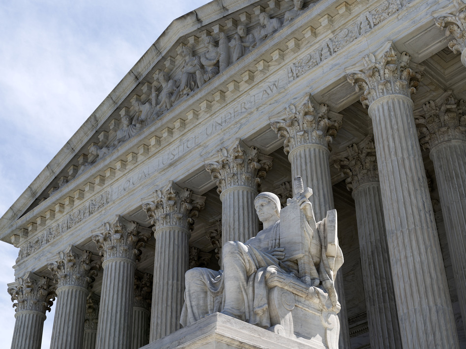 The U.S. Supreme Court will review next term whether all state laws that ban abortions before fetal viability are unconstitutional. (Jose Luis Magana/AP)