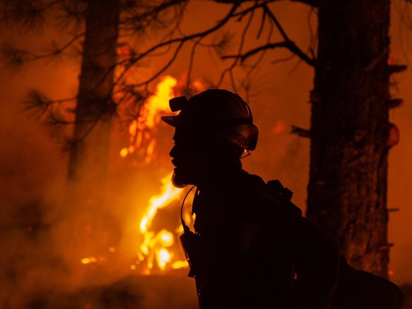 A firefighter during night operations recently on the Bootleg fire in southern Oregon. (inciweb.nwcg.gov)