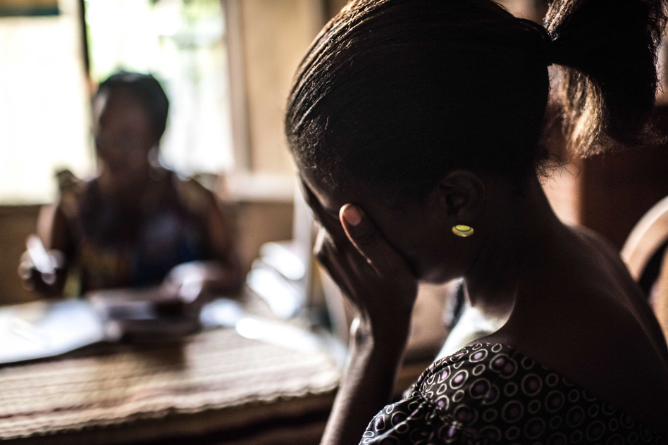 Counseling a newly diagnosed HIV patient in Kinshasa, Democratic Republic of Congo. (Tommy Trenchard for NPR)