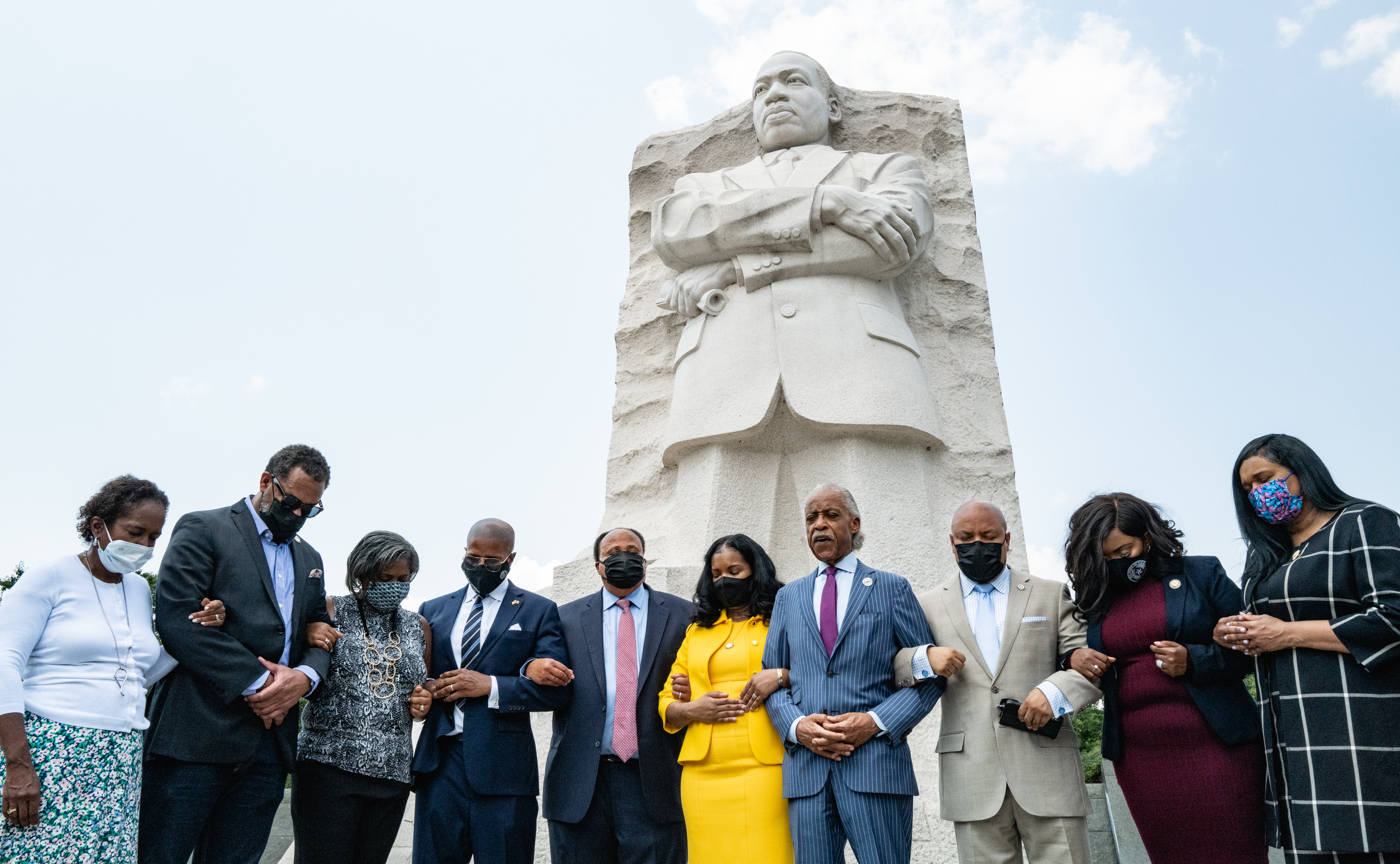 Civil rights leaders and members of the Texas Legislature last week at the Martin Luther King Jr. Memorial in Washington, D.C. They were meeting to discuss actions to stop restrictive voting measures. (Getty Images)