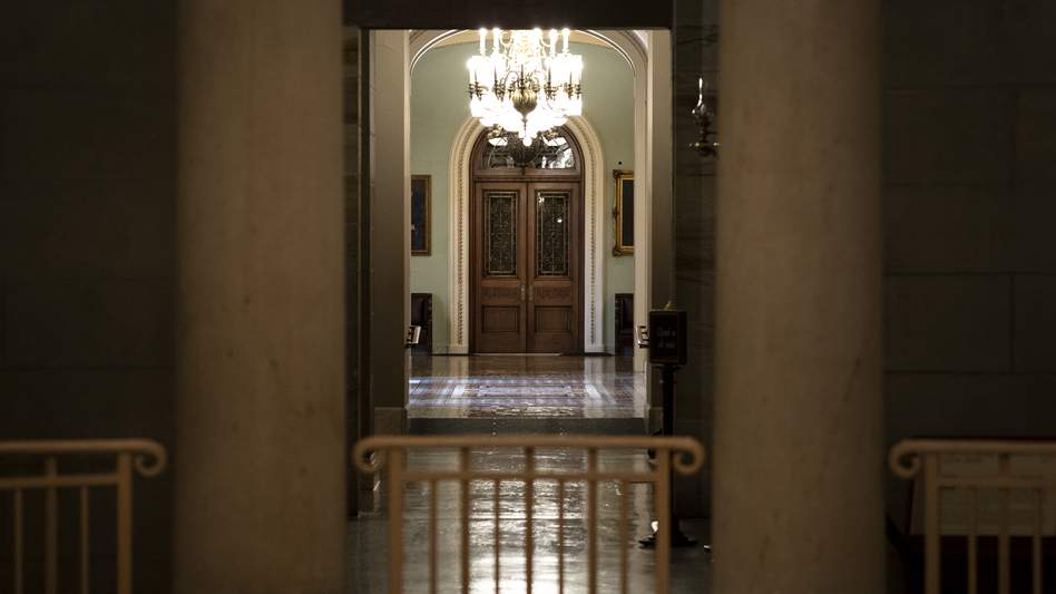Empty hallways outside the U.S. Senate chamber, where the body will consider major pieces of legislation that could allocate trillions of dollars for infrastructure and other priorities. (Drew Angerer/Getty Images)