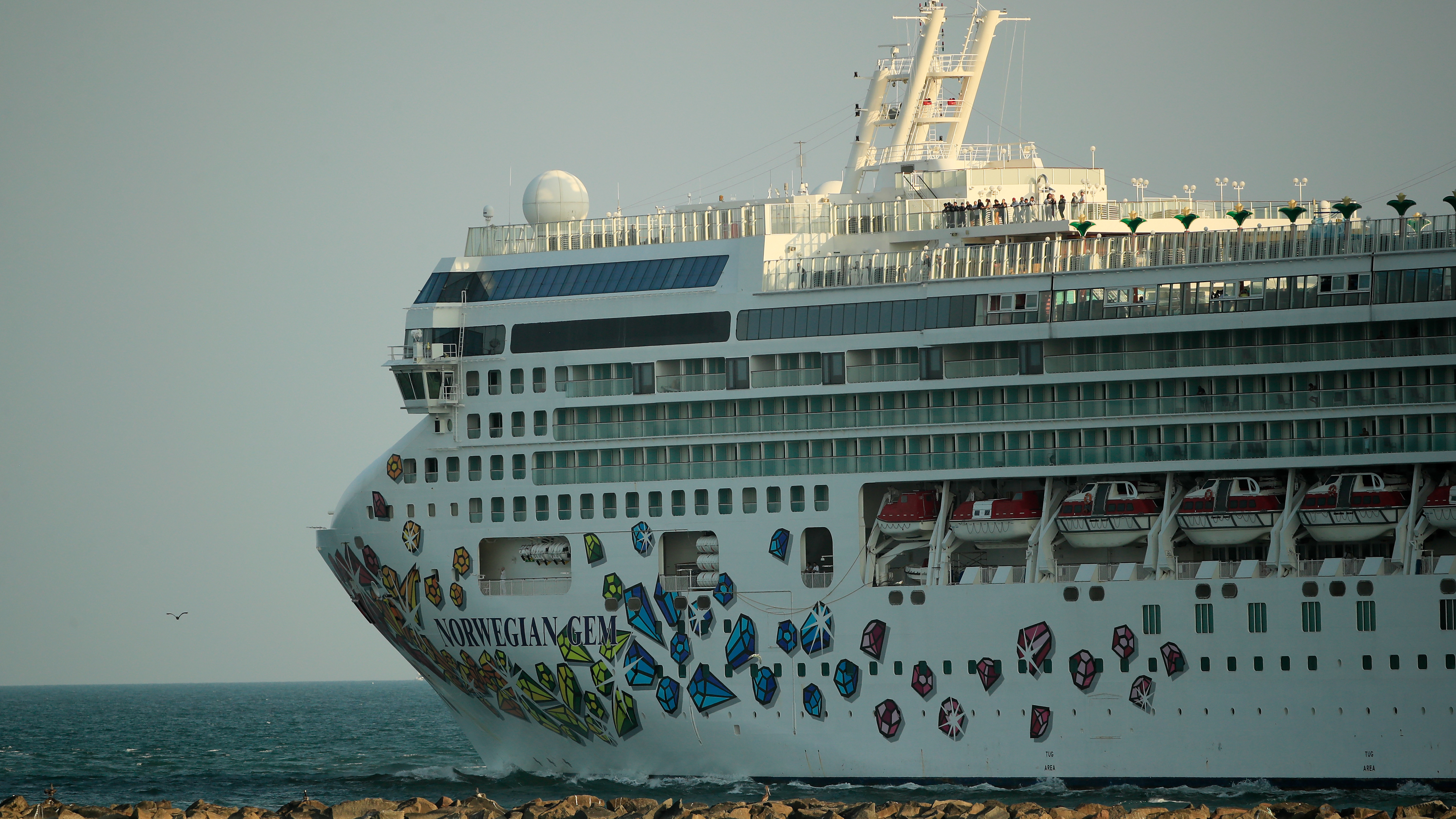 The Norwegian Gem cruise ship leaves the Port of Miami in April 2020. The Norwegian Gem's first trip since a pandemic-induced hiatus is scheduled to sail from Miami on Aug. 15.