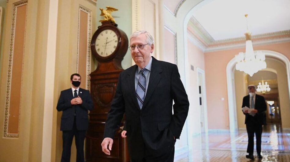 Senate Minority Leader Mitch McConnell of Kentucky is among the 19 Republicans who voted for the $1 trillion infrastructure bill on Tuesday. (Mandel Ngan/AFP via Getty Images)