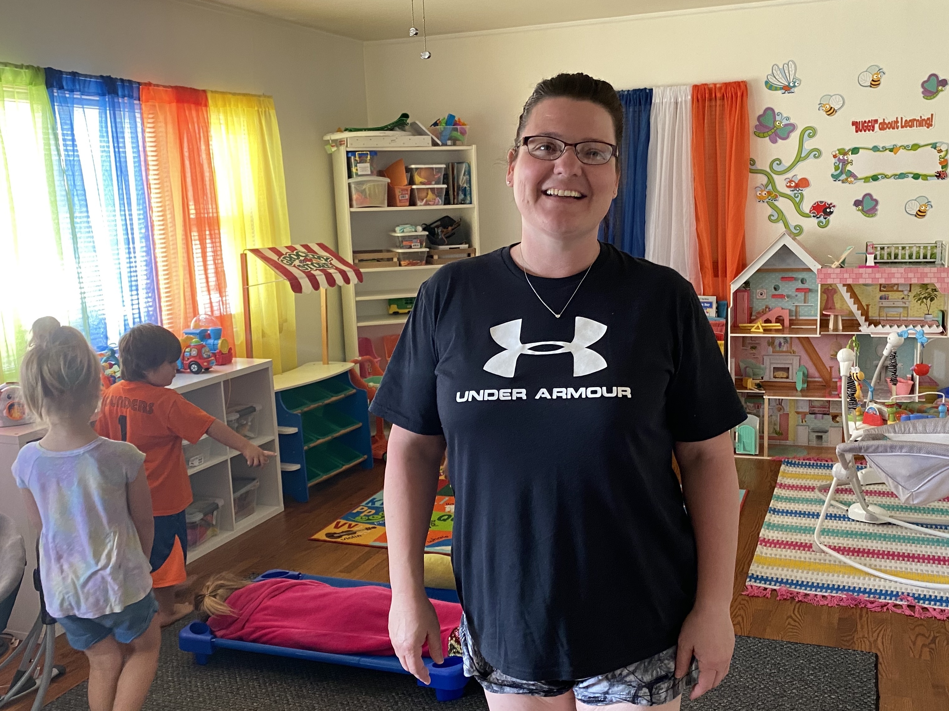 Crystal Rogers first opened Cozy Couch Family Day Care out of her home 13 years ago. Many of the kids who attend her day care in Martinsburg, W.Va., are the children of essential workers. (NPR)