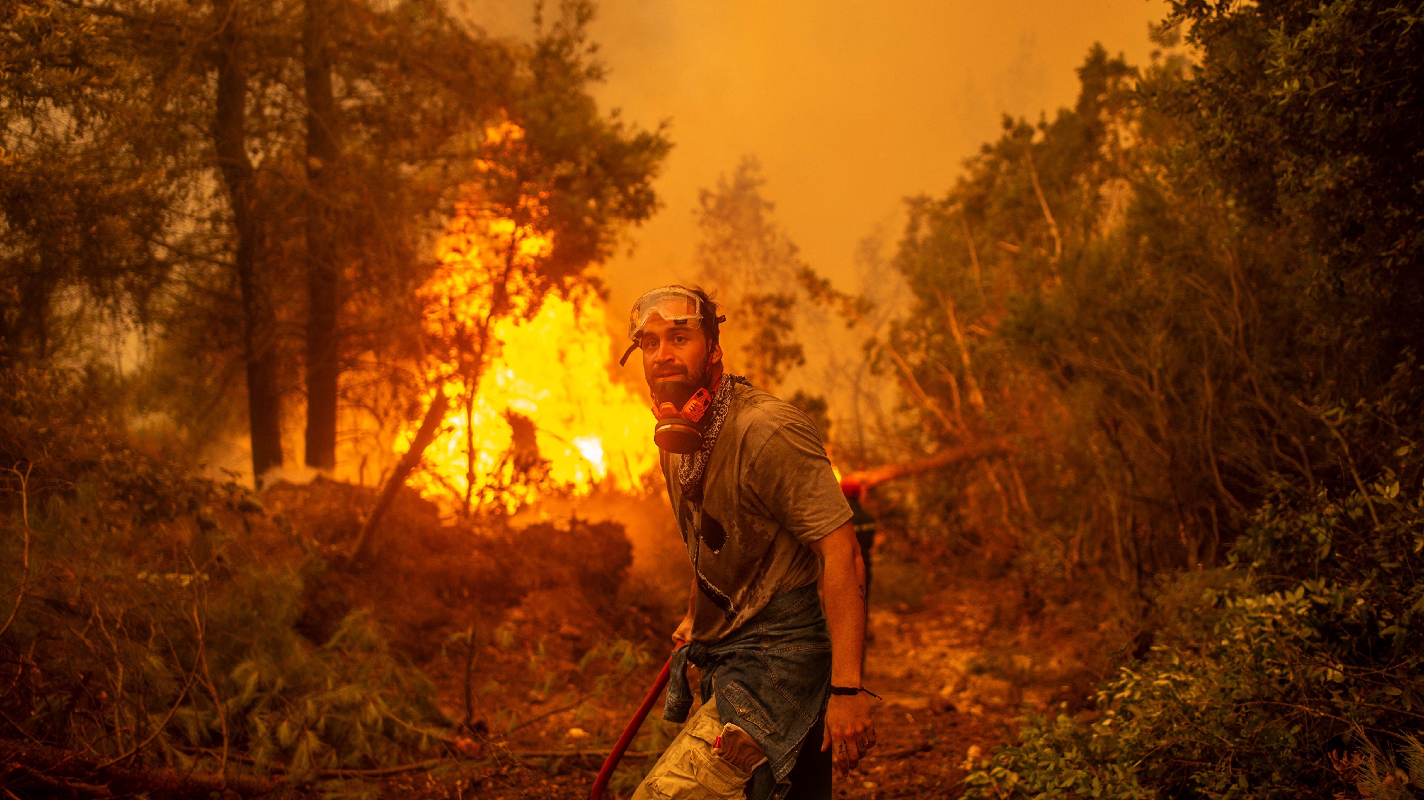 Photos: Wildfires and flooding ravage some countries of the Mediterranean : The Picture Show : NPR - Vimarsana News