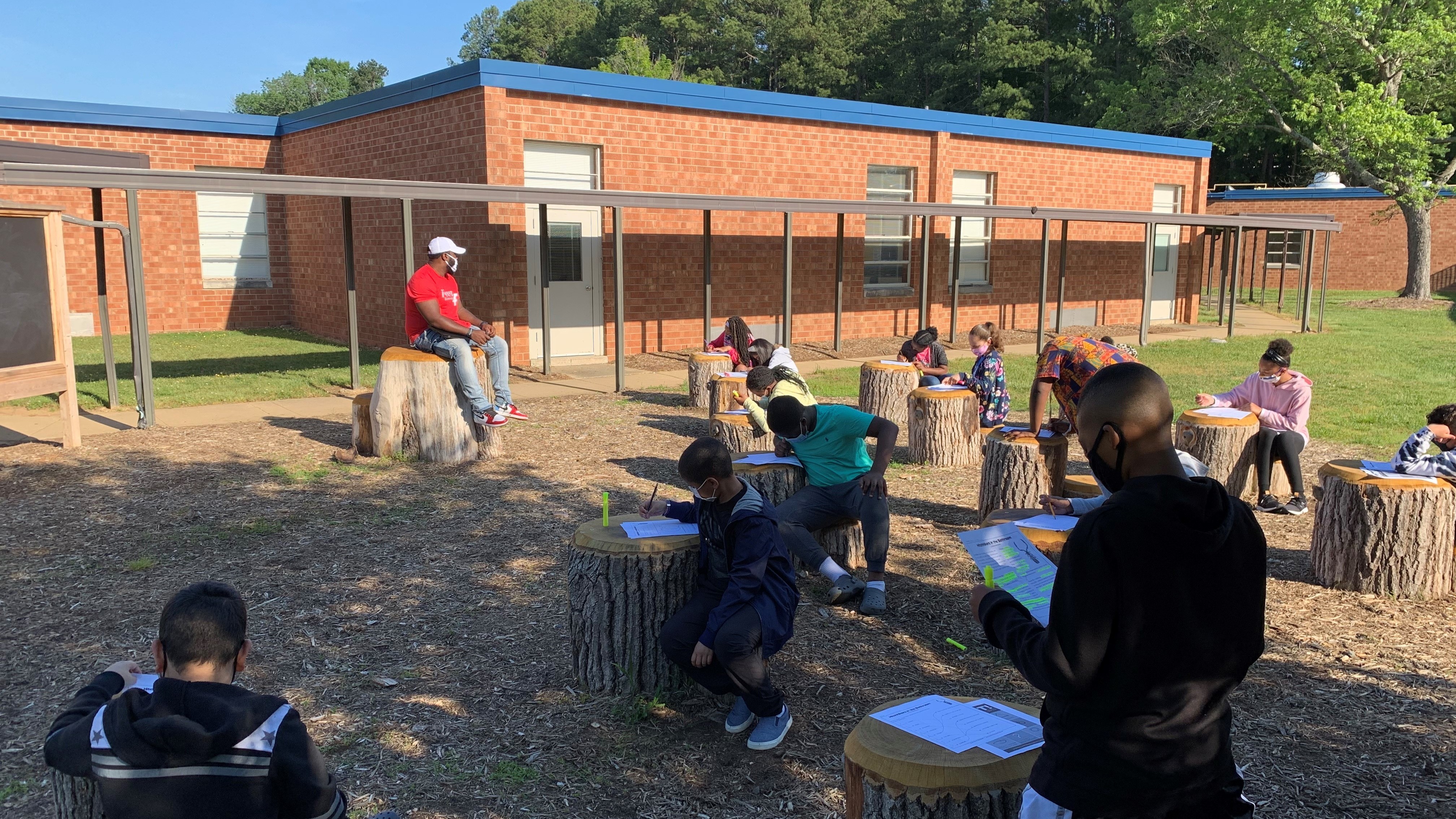 Students at Foust Elementary School in Greensboro, North Carolina gather in an outdoor classroom. (Nicholas L. Dixon)
