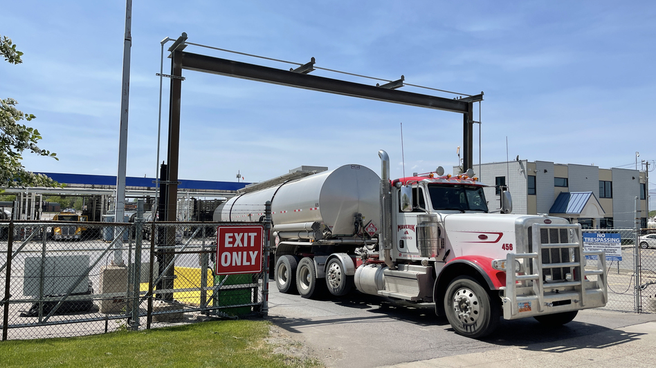A driver exits the yard after filling up his gas tanker truck at Marathon Oil on May 20 in Salt Lake City. (George Frey/Getty Images)