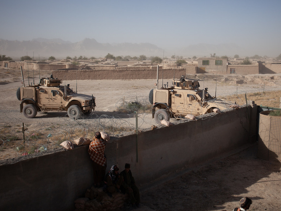 U.S. soldiers enter a compound for a security meeting in Shah Joy District, Zabul Province, Afghanistan in the fall of 2010. (Alex Dudley)