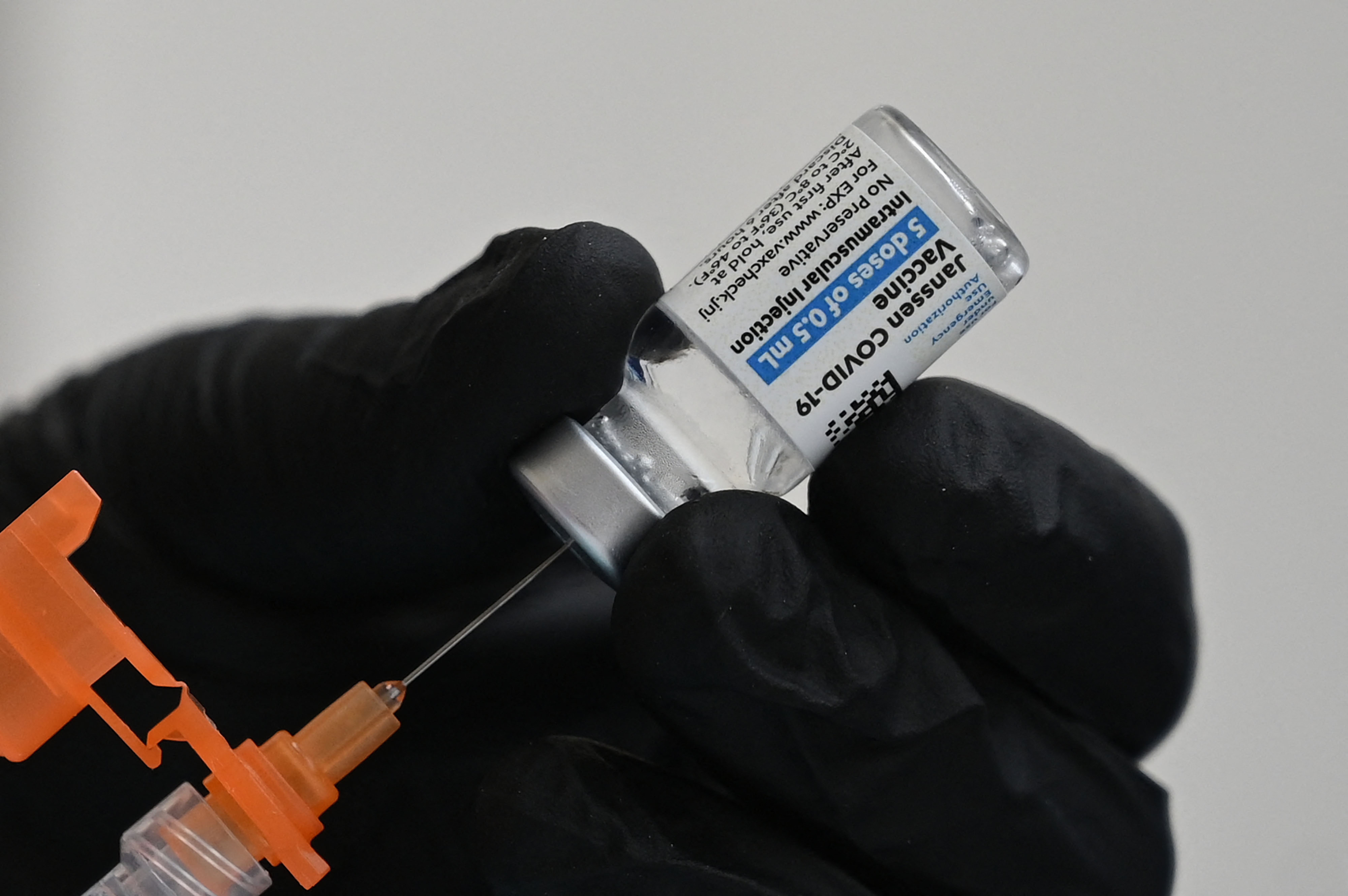 A nurse fills a syringe with Johnson & Johnson's COVID-19 vaccine at a clinic in Pasadena, Calif., on Thursday. (AFP via Getty Images)