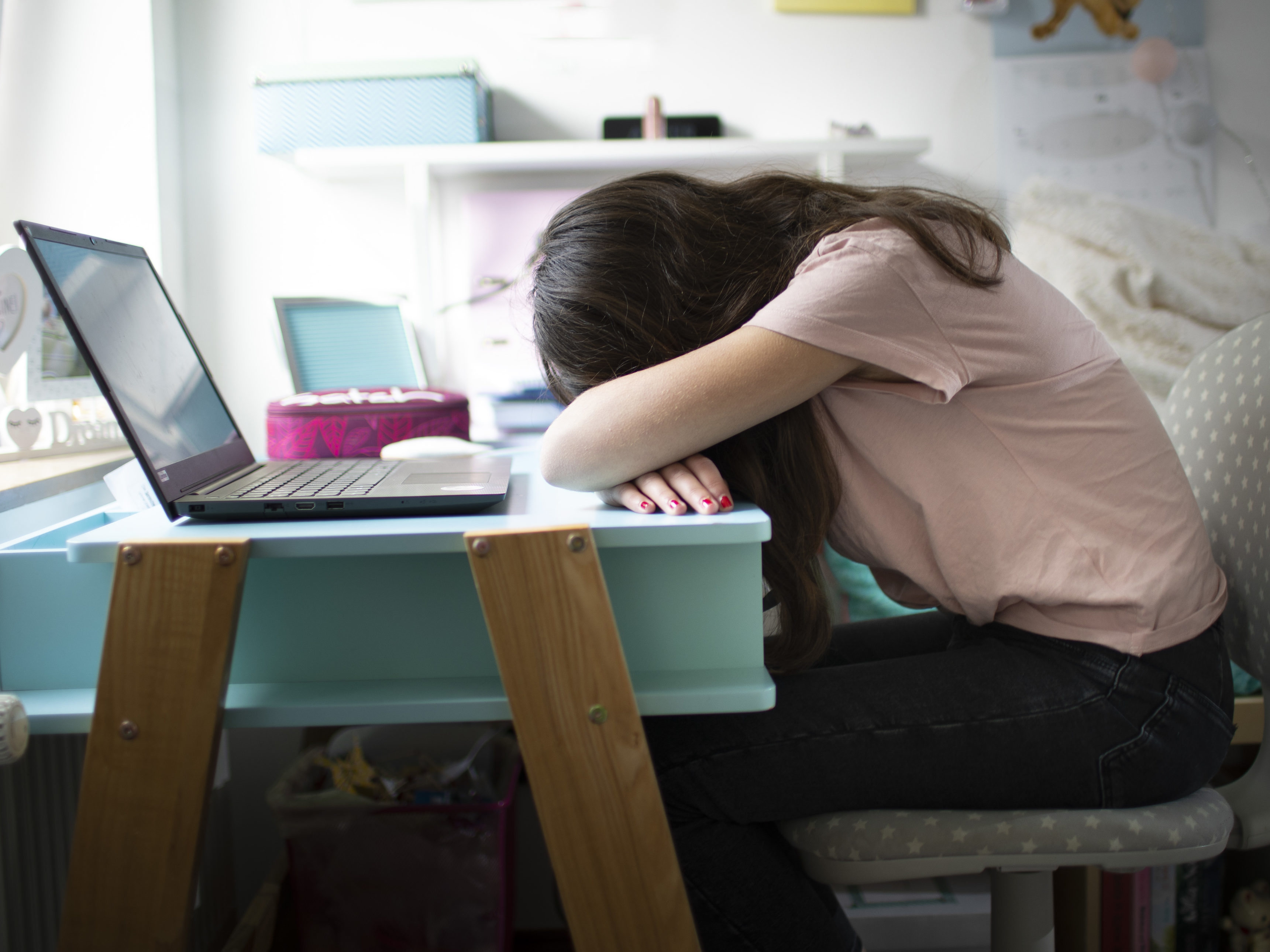 The pandemic — among other things — has taken a toll on children. The Biden administration is trying to address that with new funding for mental health awareness, training and treatment. (Photothek via Getty Images)