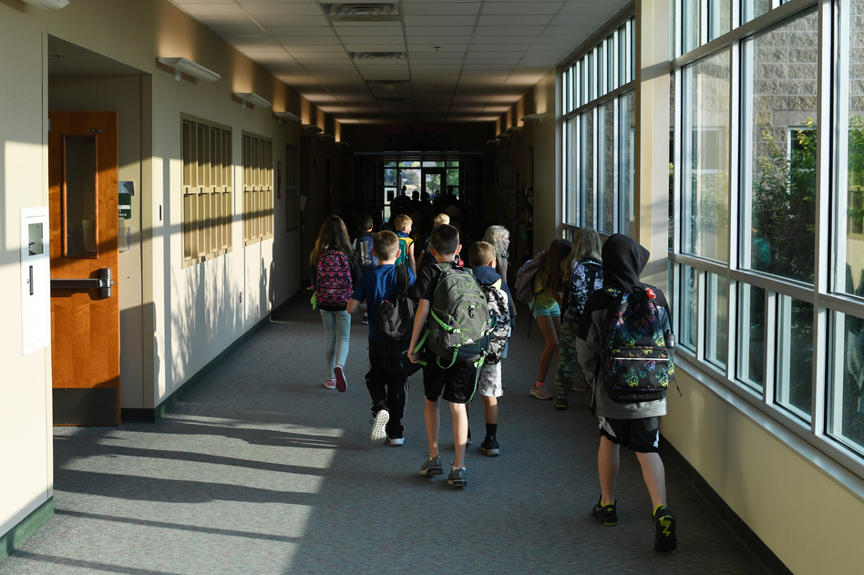 Students head to class this month in Thornton, Colo. Infectious disease experts say the decline in vaccination rates against childhood diseases during the pandemic has increased the potential for outbreaks of diseases once largely vanquished in the United States. (RJ Sangosti/MediaNews Group/The Denver Post via Getty Images)
