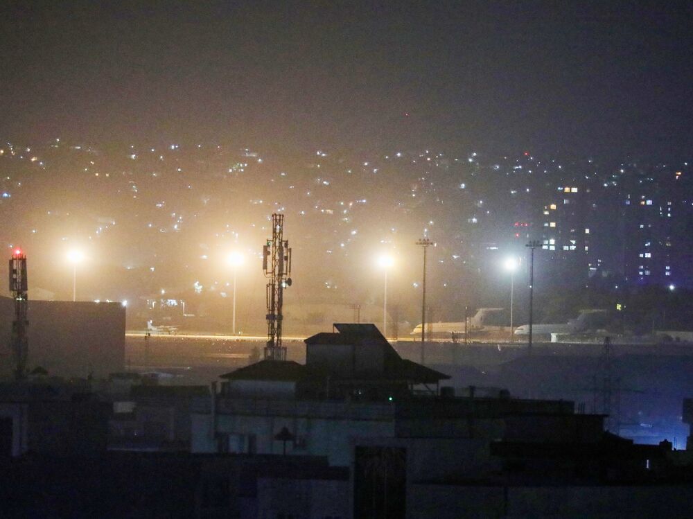 Planes are seen on the tarmac at the airport in Kabul late on August 30, 2021, hours ahead of the U.S. deadline to complete its frenzied withdrawal from Afghanistan. (AFP via Getty Images)