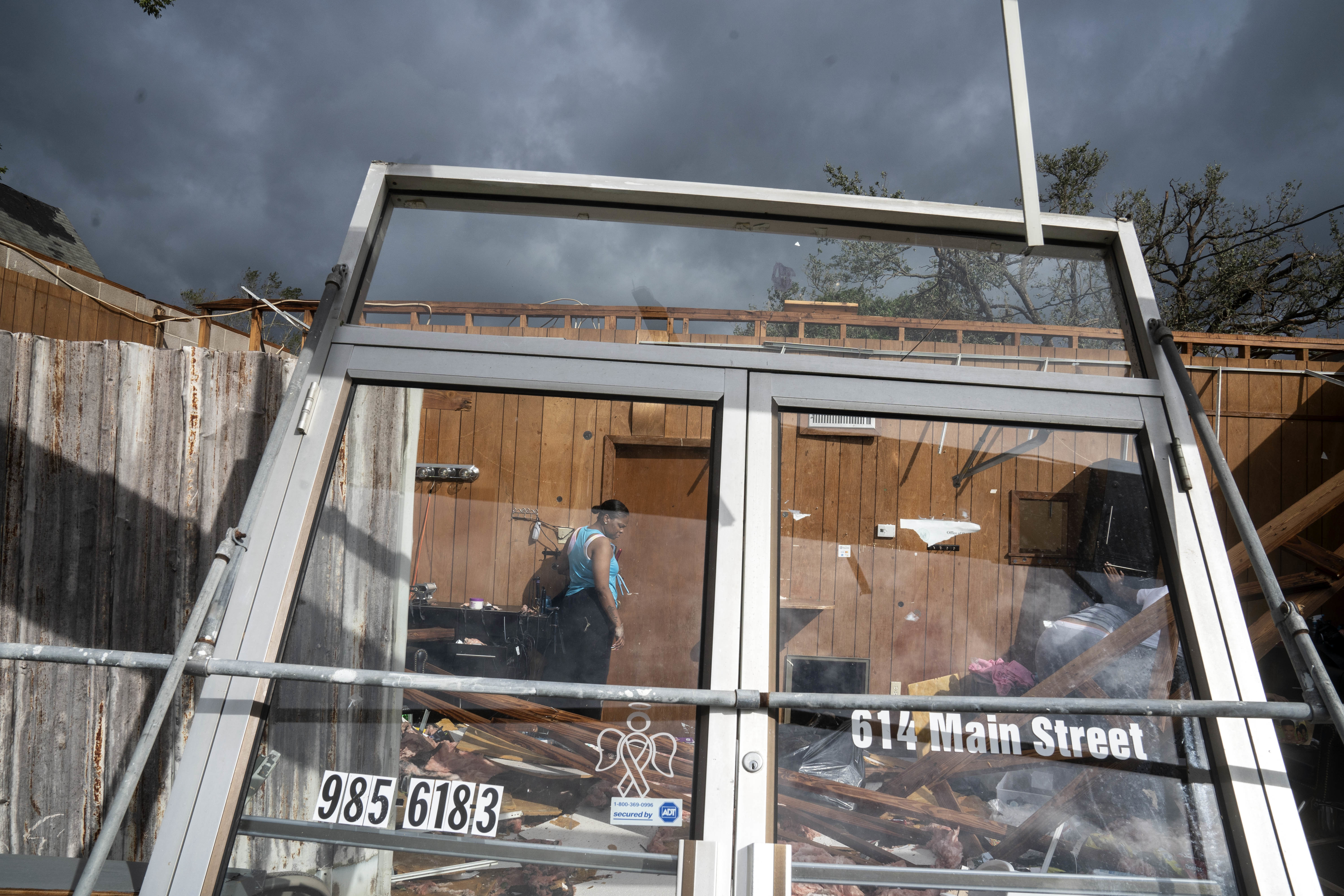 Mon., Aug. 30: Marquita Jenkins stands in the ruins of the Be Love hair salon, owned by her mother, which was destroyed by Hurricane Ida on August 30, 2021 in LaPlace, Louisiana. Idas eastern wall went right over LaPlace inflicting heavy damage on the area.