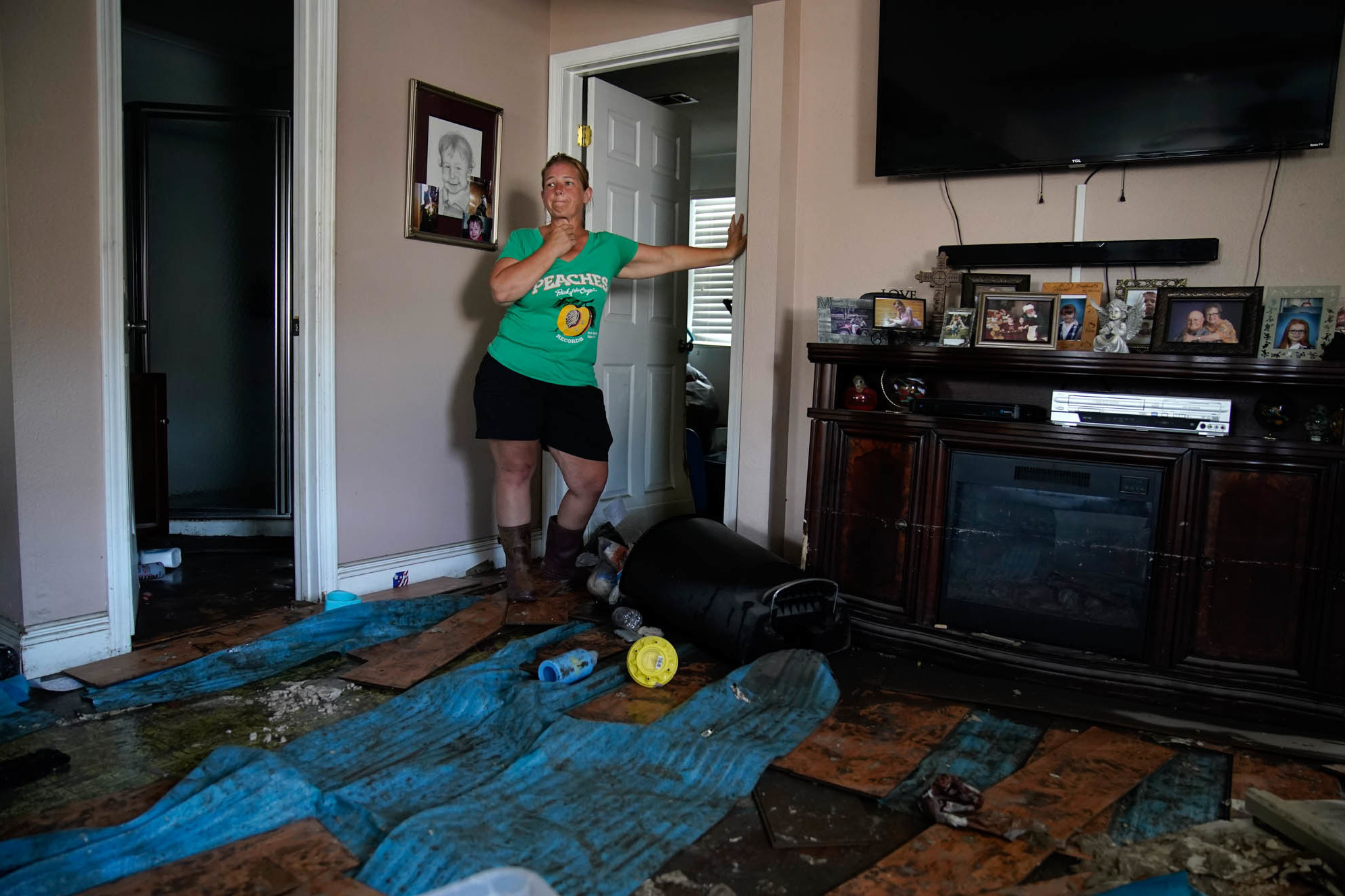 Weds., Sept. 1: Natalie Francois stands in her flood damaged home in the aftermath of Hurricane Ida in Jean Lafitte, La.