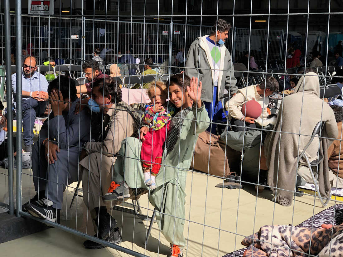 Astonishing photos show a two-mile RUNWAY at Ramstein Air Base as a tent  city for Afghan evacuees