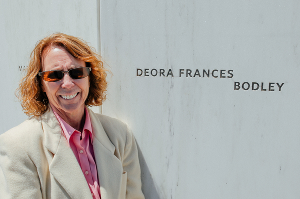 Debby Borza stands next to her daughter's name at the Flight 93 Memorial. She says the space feels like a second home.