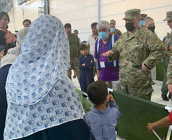 Joint Chiefs chairman Gen. Mark Milley visited U.S. air bases in Germany, Italy and Spain over the weekend, where Afghans were screened before heading to the United States. Milley talked with refugees, asking about the food and medical services and their lives back in Afghanistan.