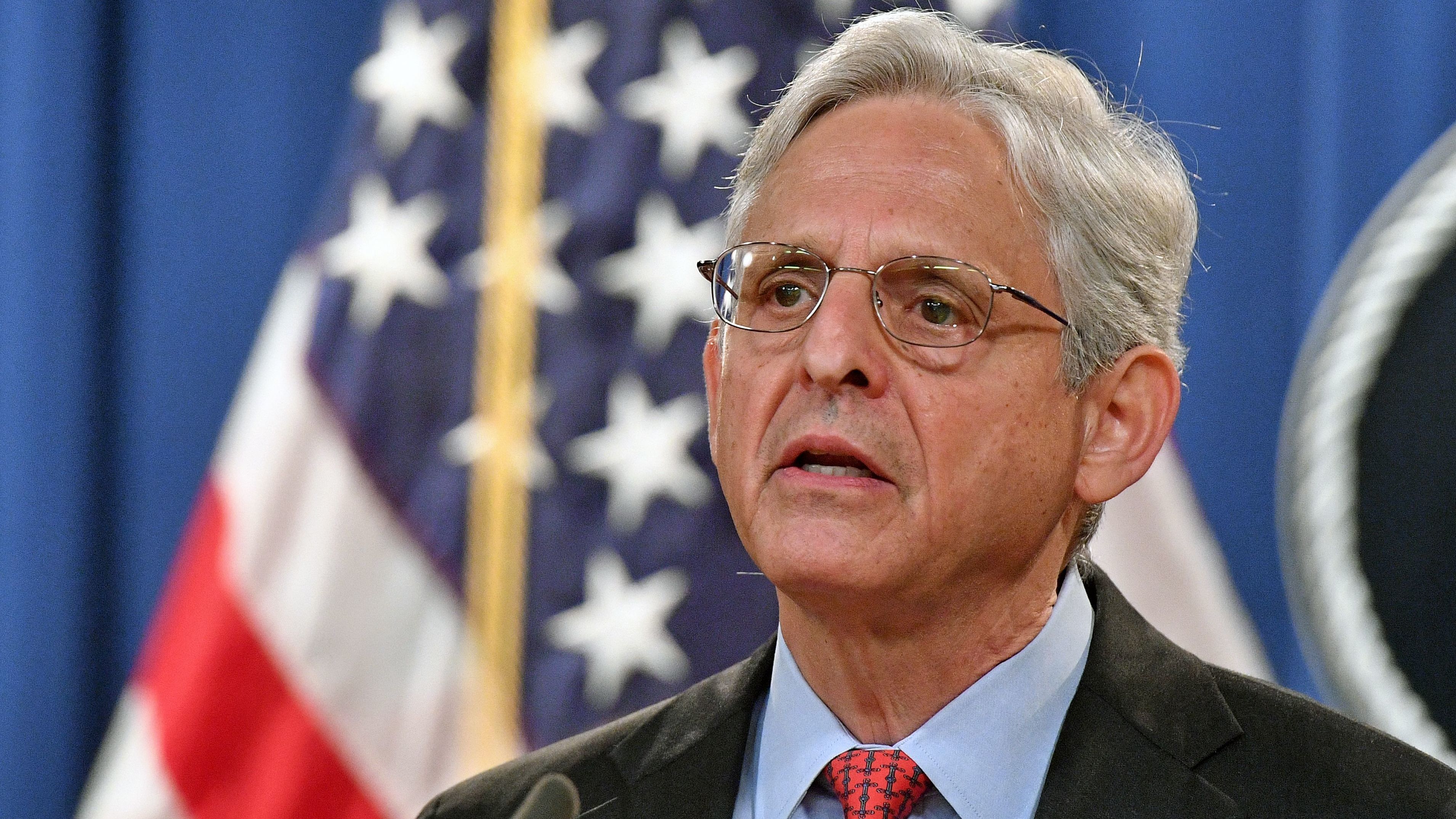 U.S. Attorney General Merrick Garland holds a press conference Thursday to announce a lawsuit against Texas. The Department of Justice is seeking a permanent injunction against the state's new abortion law. (AFP via Getty Images)