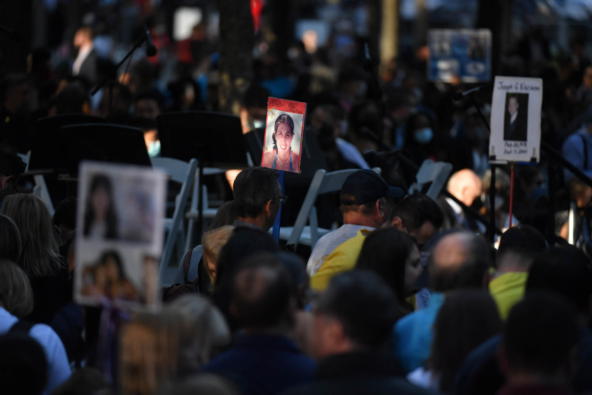 Photos: Scenes From 9/11 National Memorials 2 Family and friends carry photos of some of the more than 2,600 victims to the ceremony commemorating the 20th anniversary of the 9/11 attacks on the World Trade Center.
