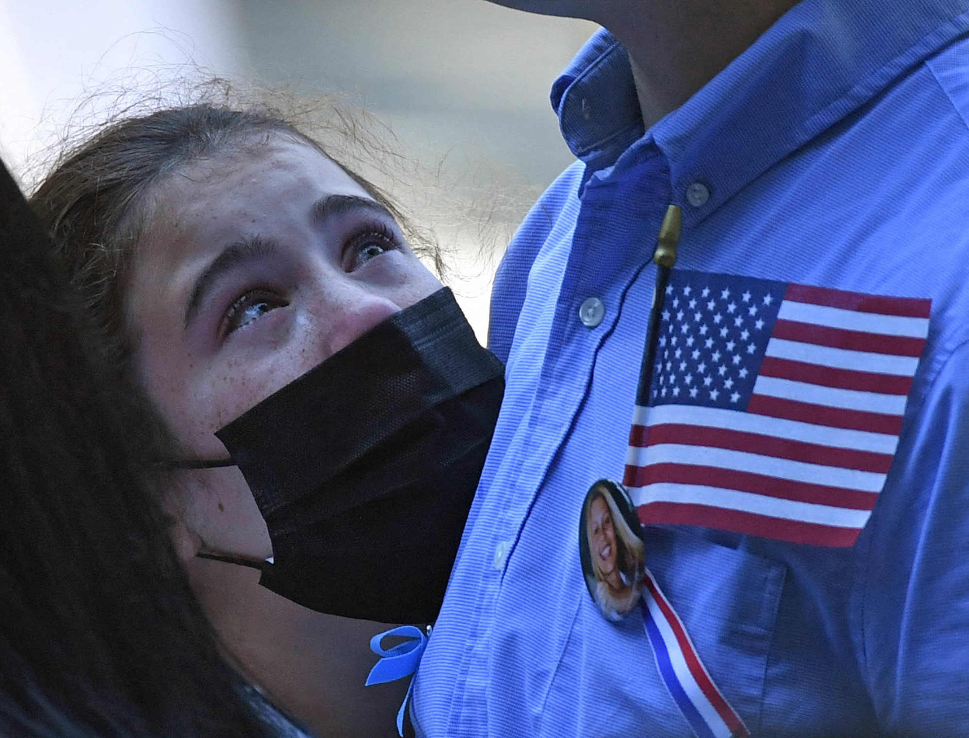 Photos: Scenes From 9/11 National Memorials 1 A family member grieves at the National 9/11 Memorial and Museum ceremony commemorating the 20th anniversary of the 9/11 attacks on the World Trade Center, in New York City on Saturday.
