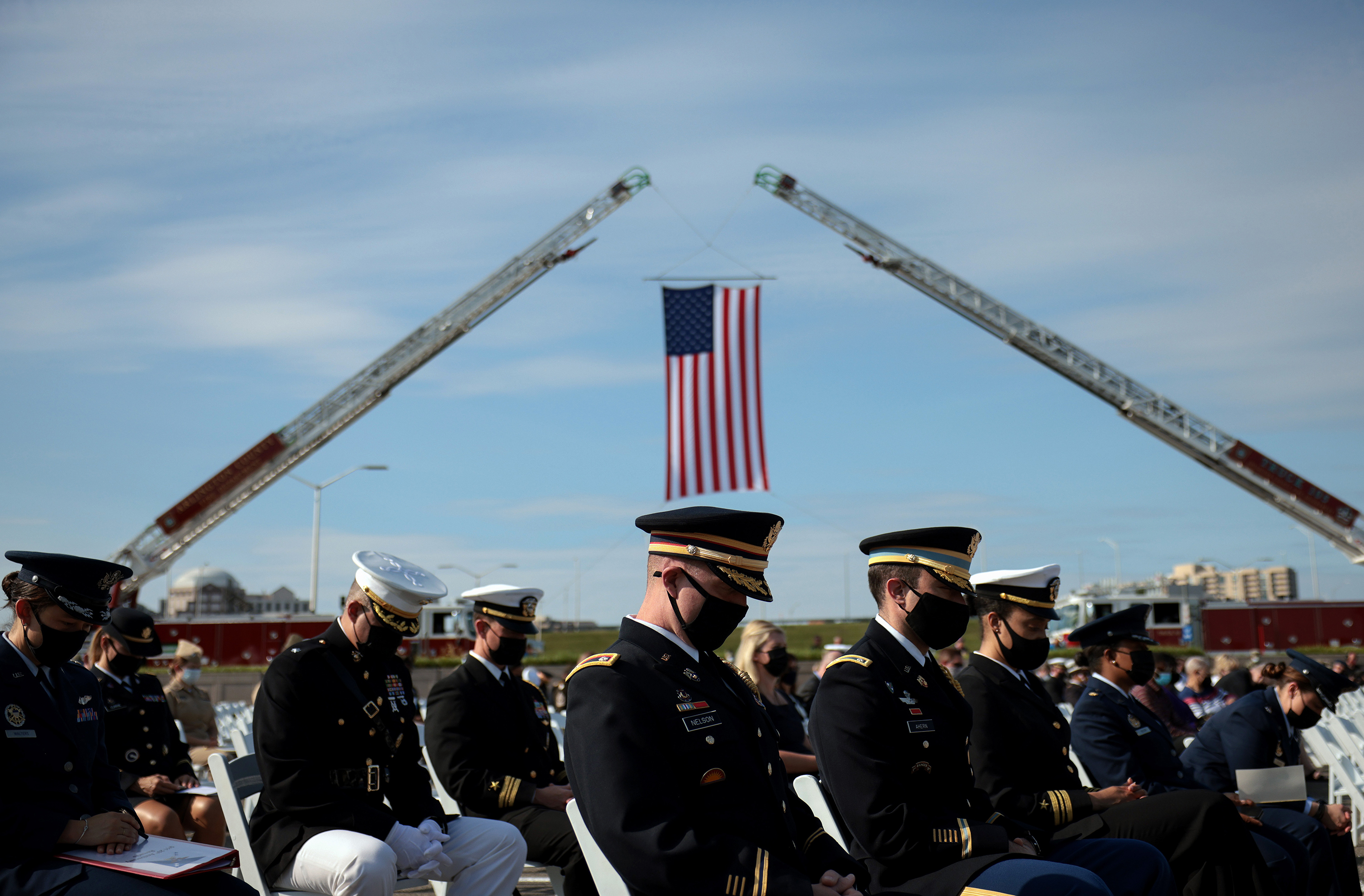 Photos: Scenes From 9/11 National Memorials 7 U.S. service members attend the 9/11 observance ceremony at the National 9/11 Pentagon Memorial in Arlington, Va.