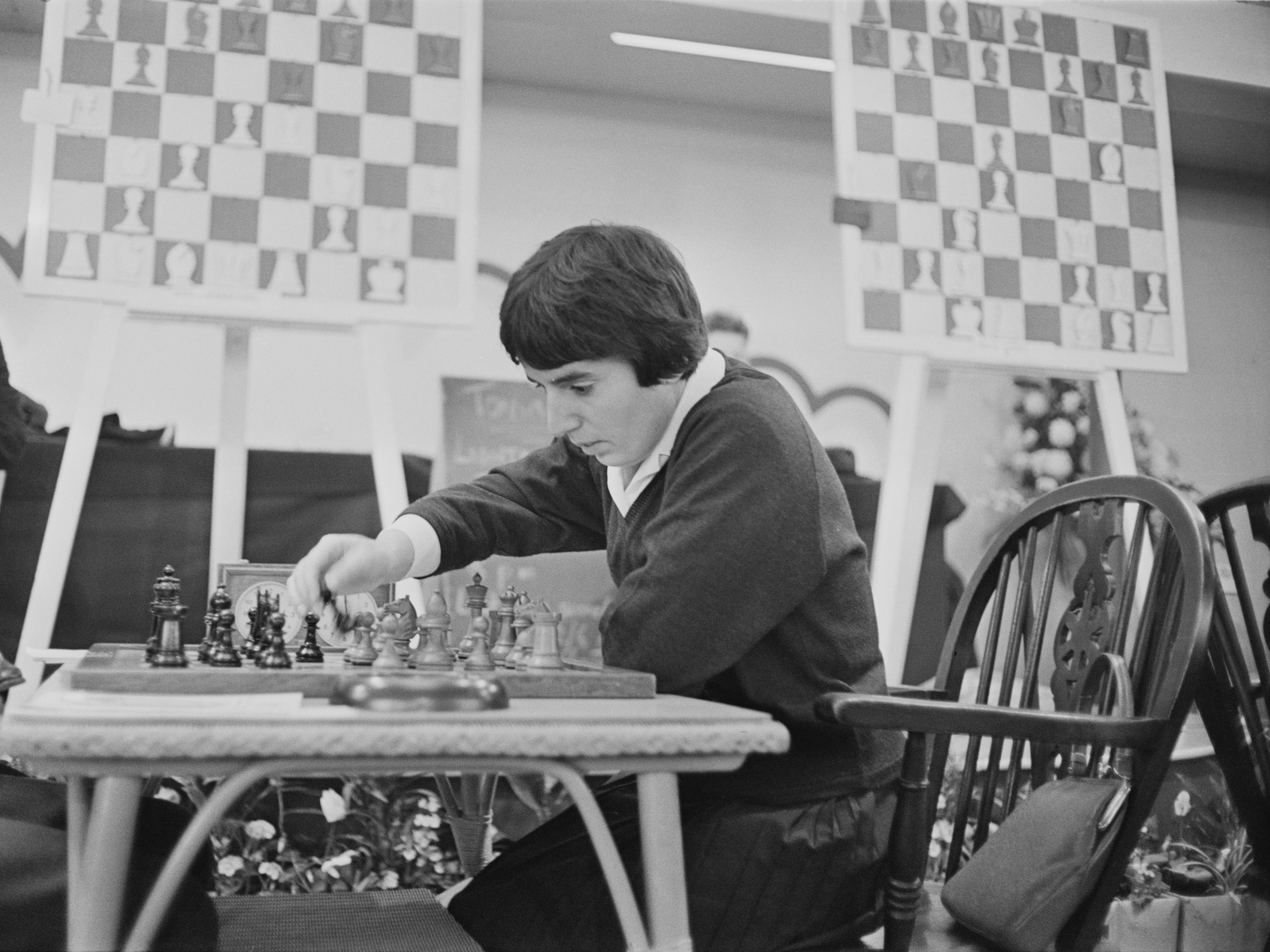 Georgian chess champion Nona Gaprindashvili plays at the International Chess Congress in London on Dec. 30, 1964. She is suing Netflix for defamation and invasion of privacy over its series <em>The Queen's Gambit.</em> (Getty Images)