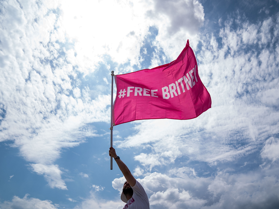 A supporter of pop star Britney Spears participating in a #FreeBritney rally on July 14 in Washington, D.C. When anyone poses a high risk of harm to themselves or others, psychiatrists are obligated to hospitalize them, even against their will. For many patients, paying for that involuntary care leads to long-term financial strain. (Kent Nishimura/Los Angeles Times via Getty Images)