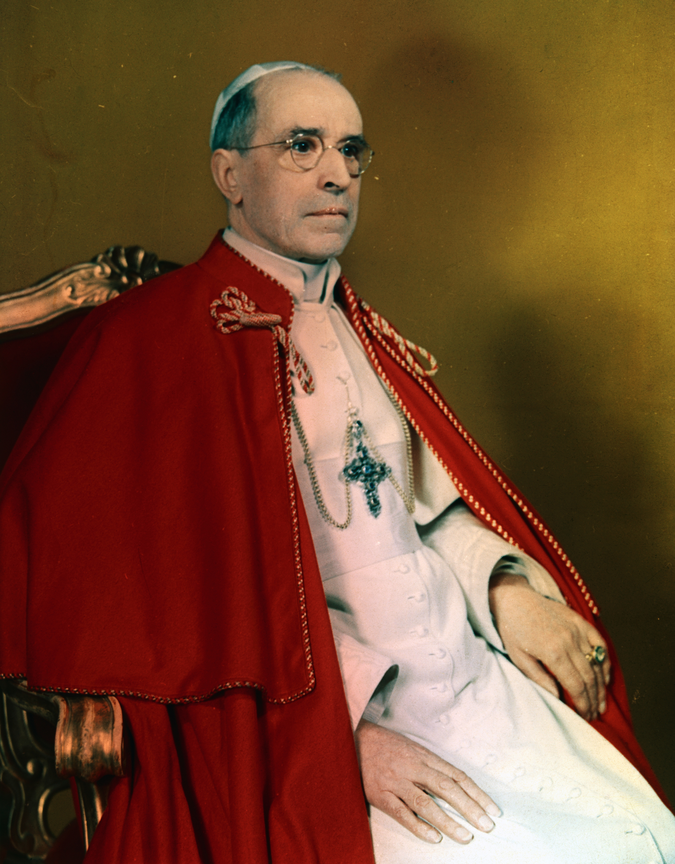 Pope Francis, who reached out to the margins of society, has died at 88 4 Portrait of Pope Pius XII seated on a throne.