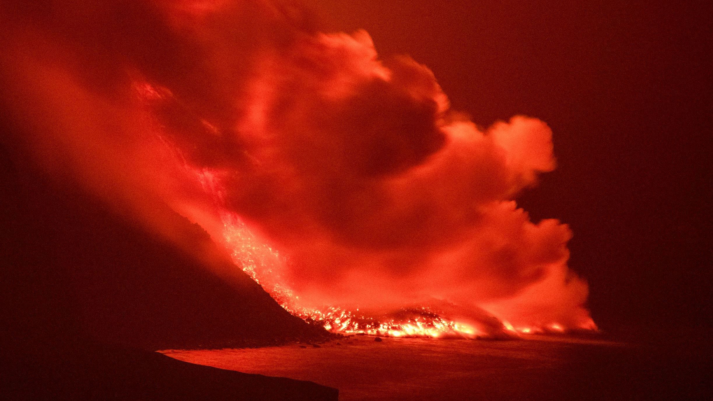 Lava from a volcano reaches the sea on the Canary island of La Palma, Spain, in the early hours of Wednesday, prompting concerns about toxic gas.