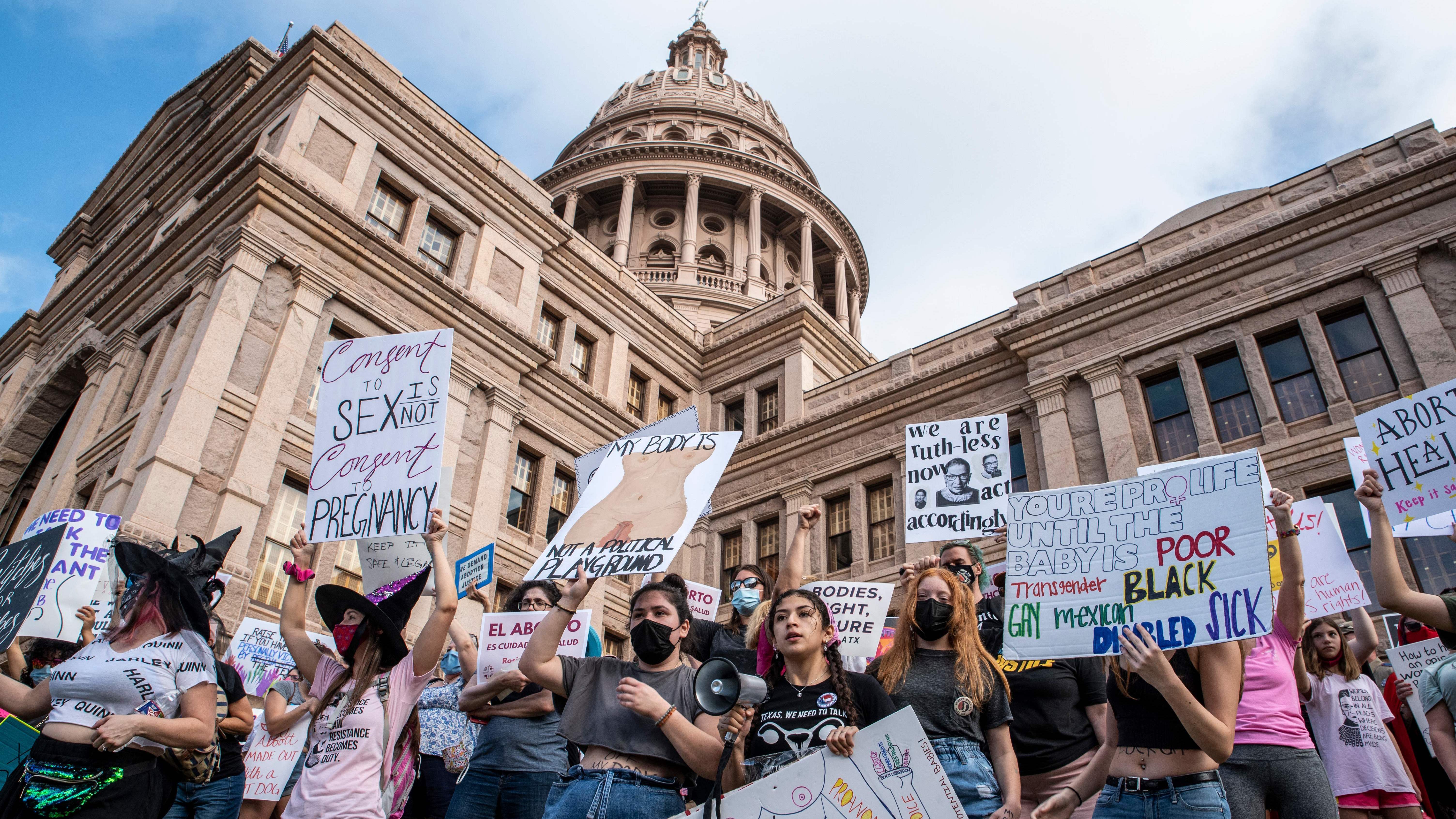 Protesters take part in the Women's March and Rally for Abortion Justice at the State Capitol in Austin, Texas, on Saturday. (AFP via Getty Images)