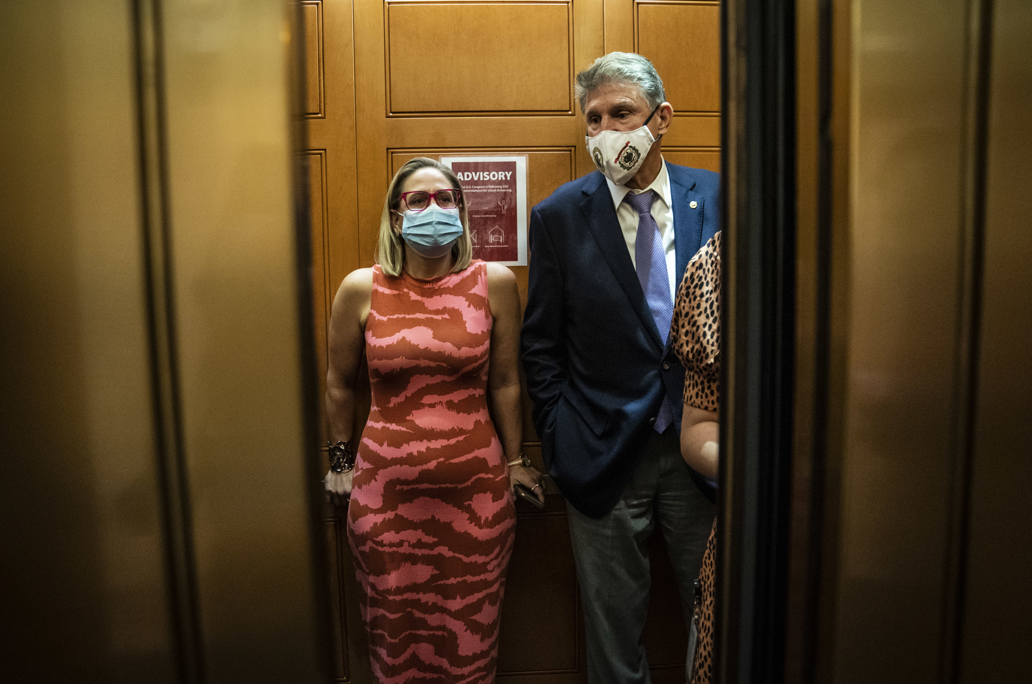 As the White House tries to try to move forward on agenda items, moderate Democrats Sen. Kyrsten Sinema, D-Ariz., and Sen. Joe Manchin, D-W.Va., have emerged as key players. They have clashed with party leaders and progressive members. (The Washington Post via Getty Images)