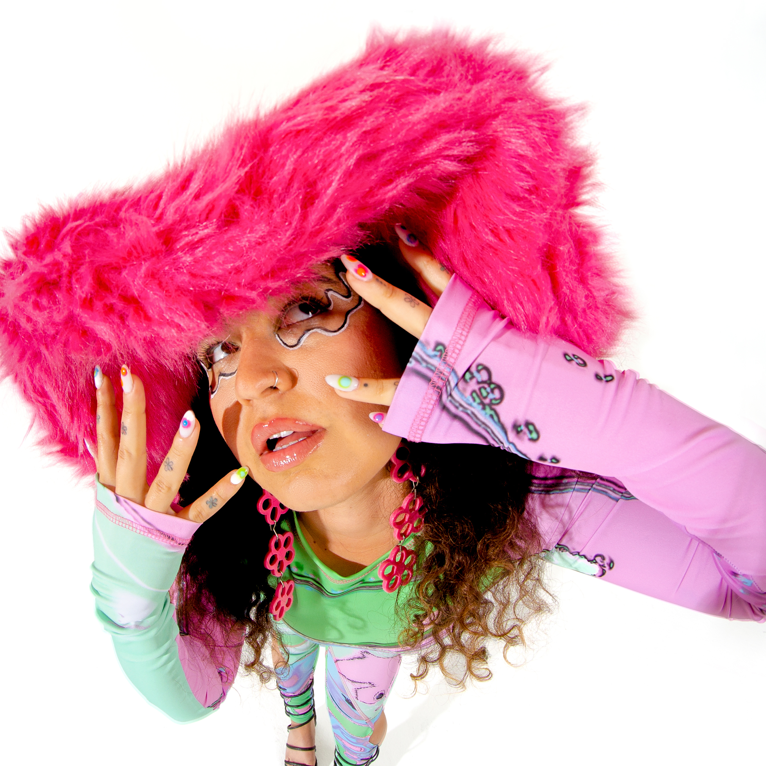 Remi Wolf, singer behind the viral Tik Tok hit, "Photo ID," and fan of outrageous hats.