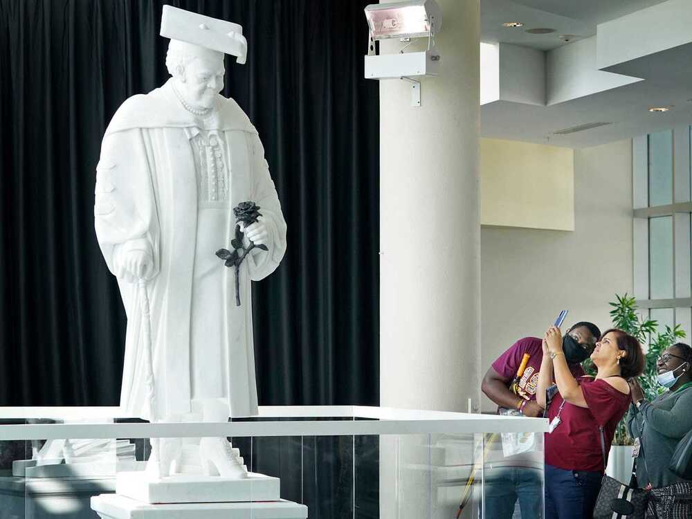 Members of the public view the newly unveiled statue of Mary McLeod Bethune at the News-Journal Center in Daytona Beach on Oct. 12. On Wednesday, the statue made its debut in the U.S. Capitol's National Statuary Hall. (USA TODAY NETWORK via Reuters Co)