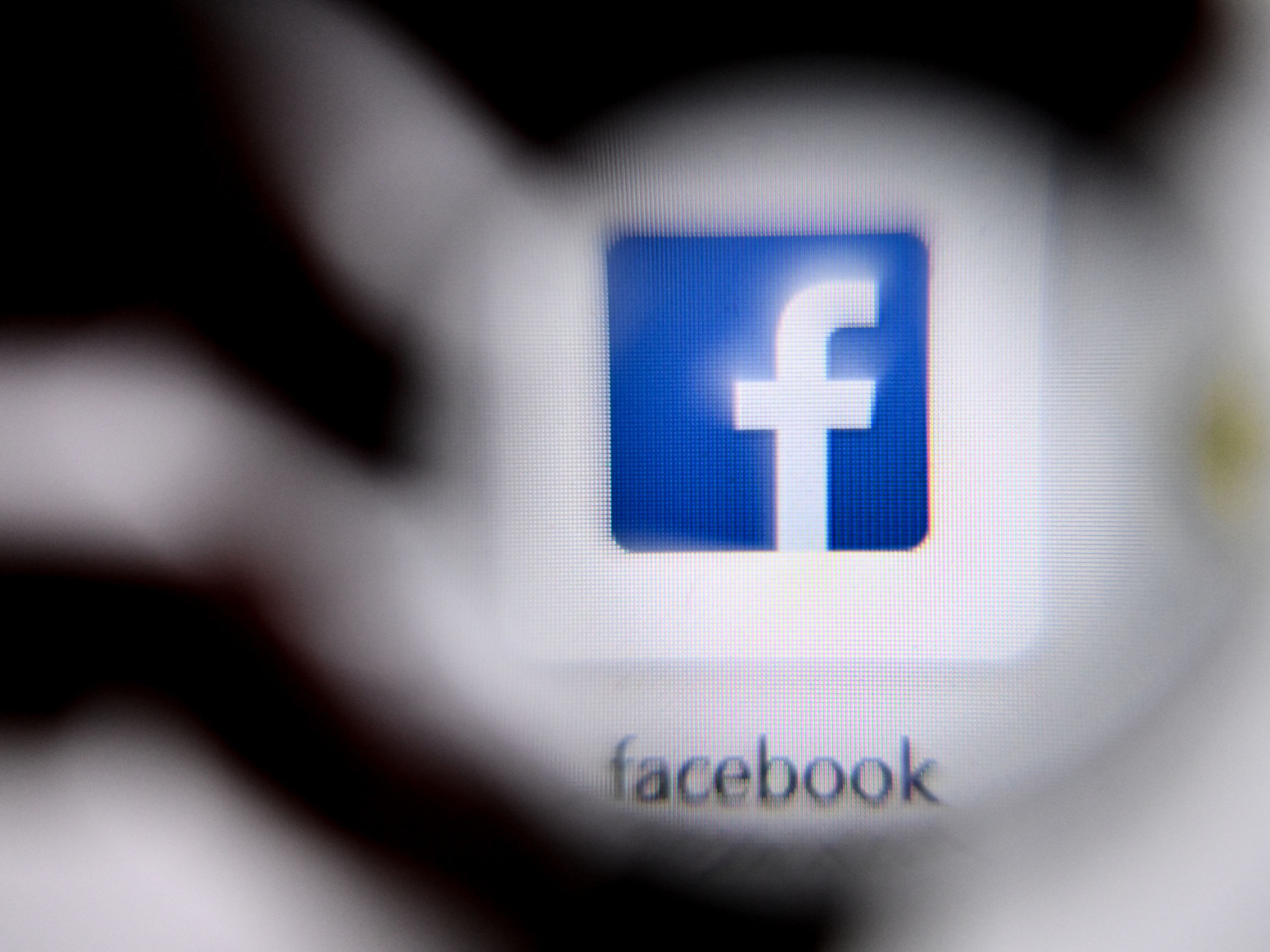 The U.S. online social media and social networking service Facebook's logo is shown on a laptop screen. Facebook has announced changes to its policies on online bullying. (AFP via Getty Images)